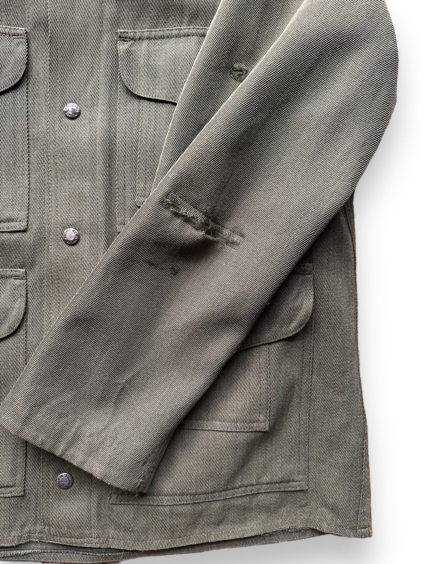 Mending on Left Arm of Vintage Filson Whipcord Cruiser SZ XL | Vintage Workwear Seattle | Vintage Filson Seattle