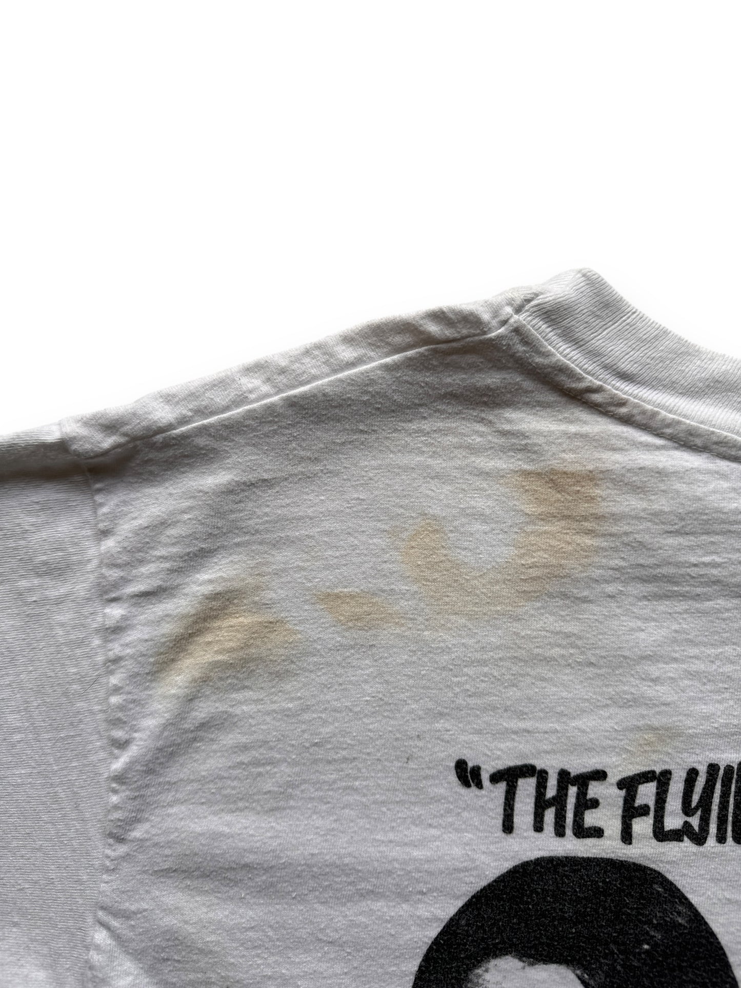 back stains on Vintage 1979 "The Flying Shoe" Racing Tee SZ M-L