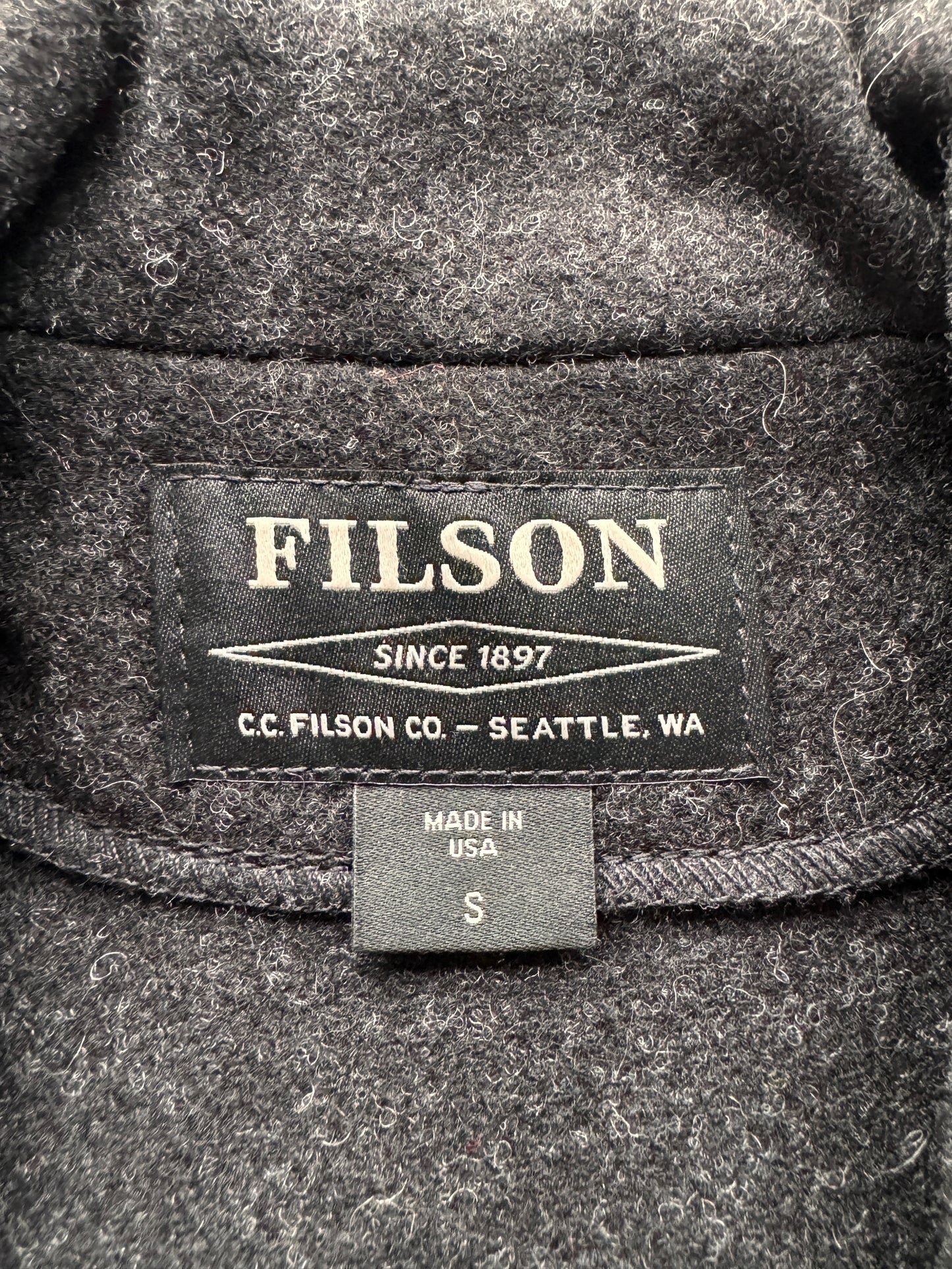 Tag on Filson Mackinaw Wool Charcoal Western Vest SZ S