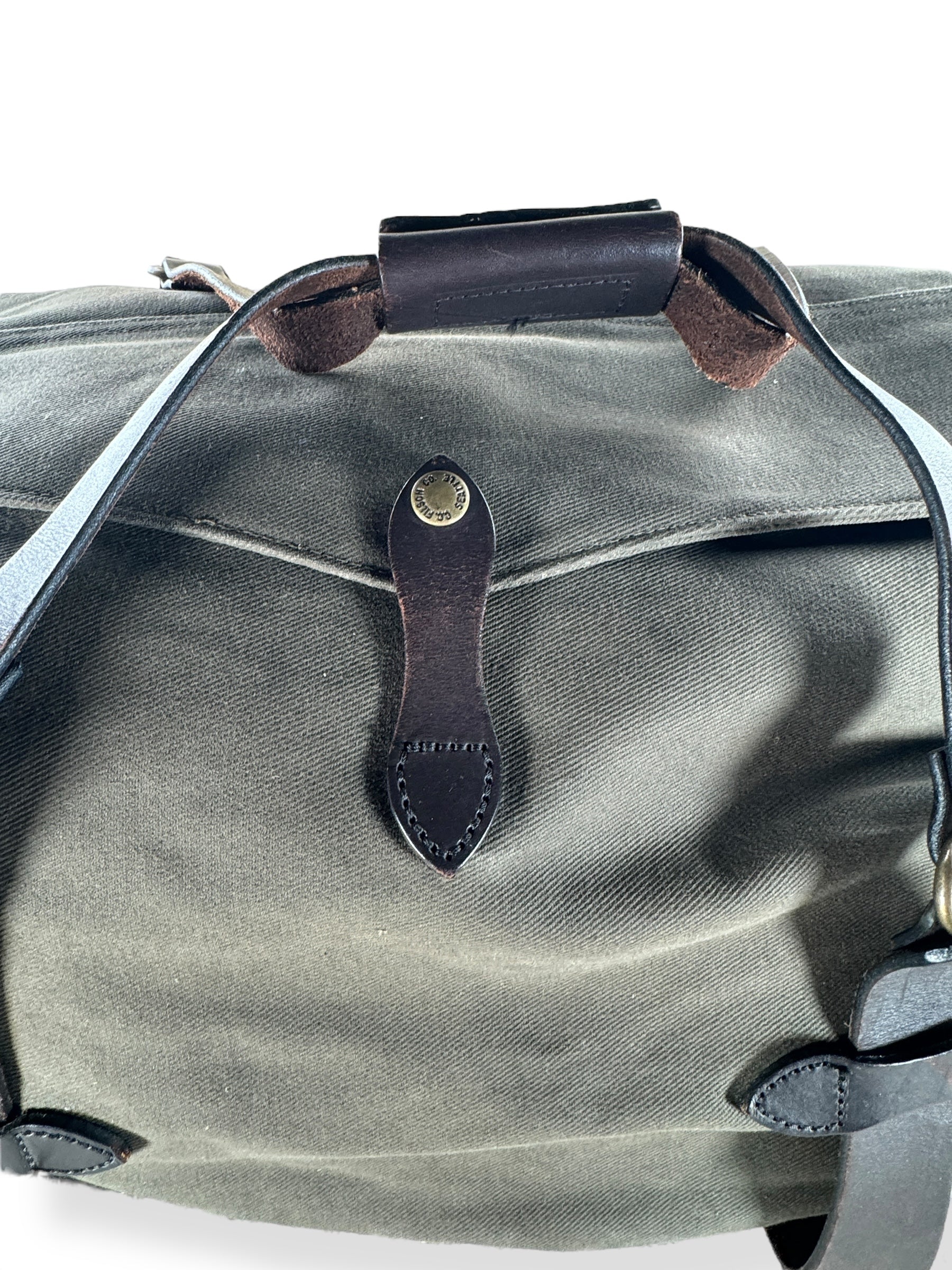 Rain Flap View of Filson Otter Green Rugged Twill Medium Duffle