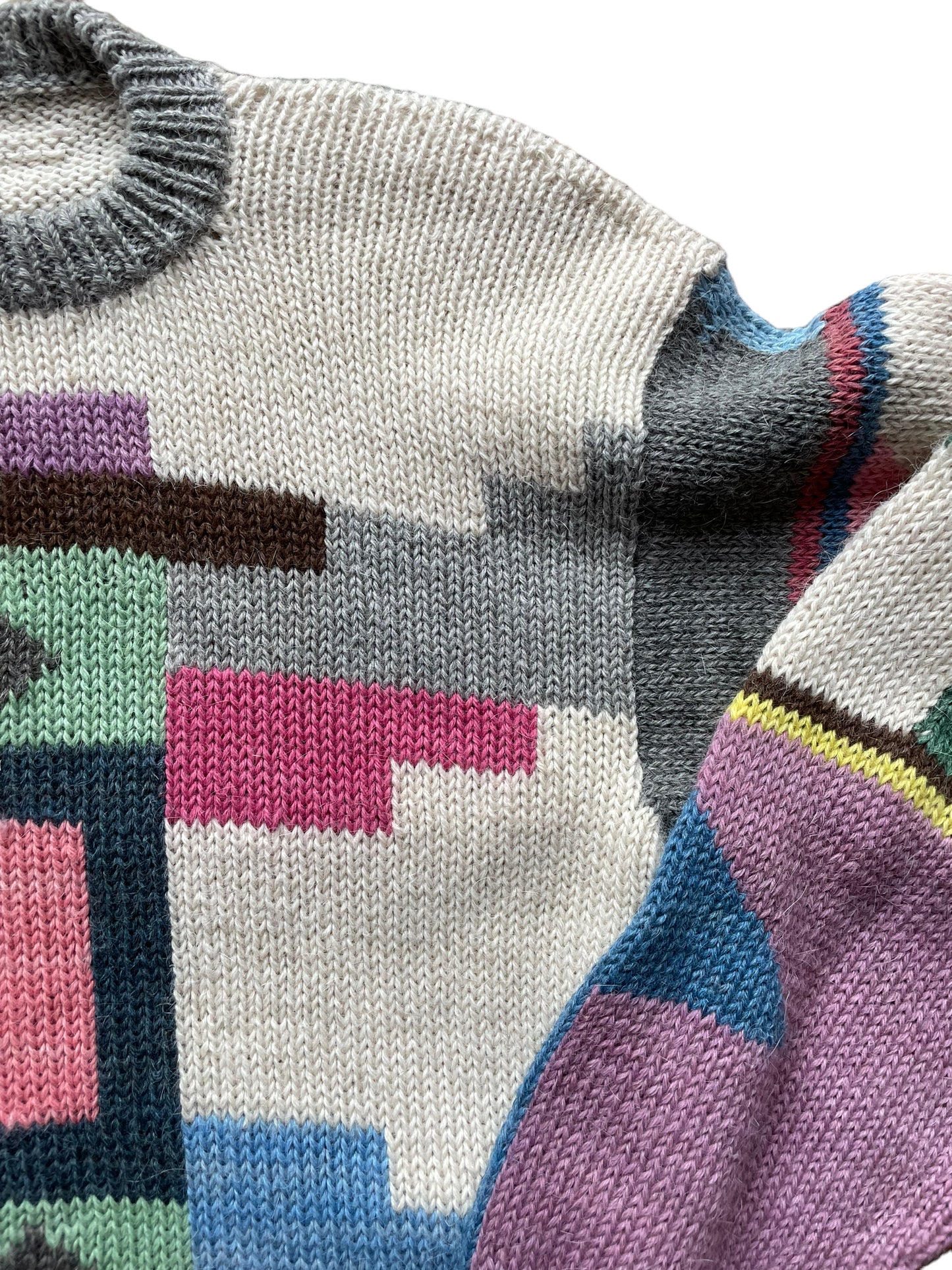 Front left side view of Vintage 1980s Geometric Wool Sweater SZ L | Barn Owl Sweaters | Seattle Vintage