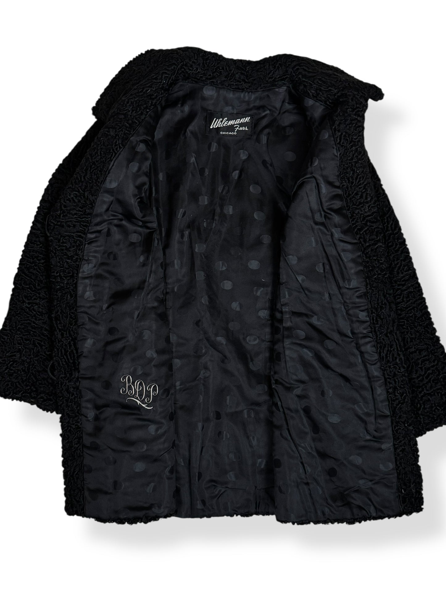 Open view of 1960s Uhlemann Furs Curly Lamb Coat L