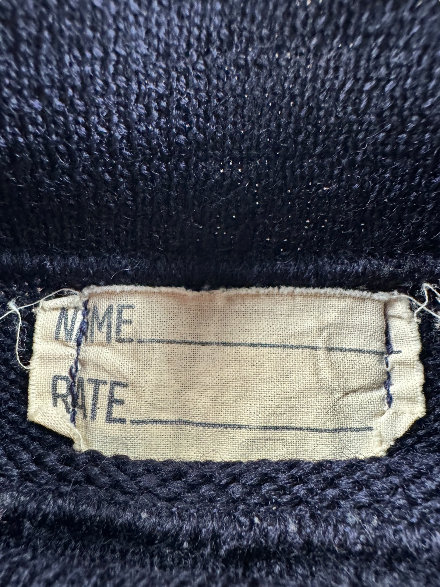 Label on Vintage USN Sweater SZ M