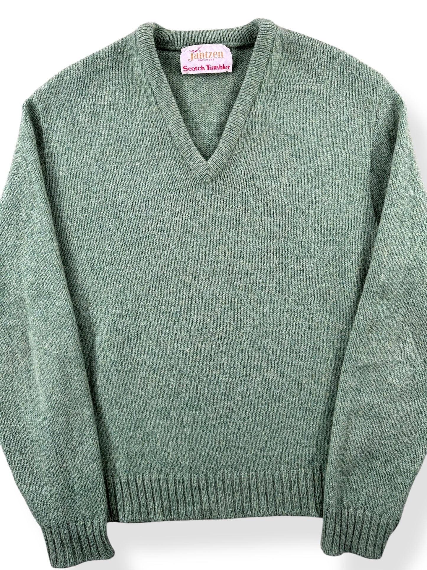 Front Close Up of Vintage Jantzen Scotch Tumbler V Neck Sweater SZ M
