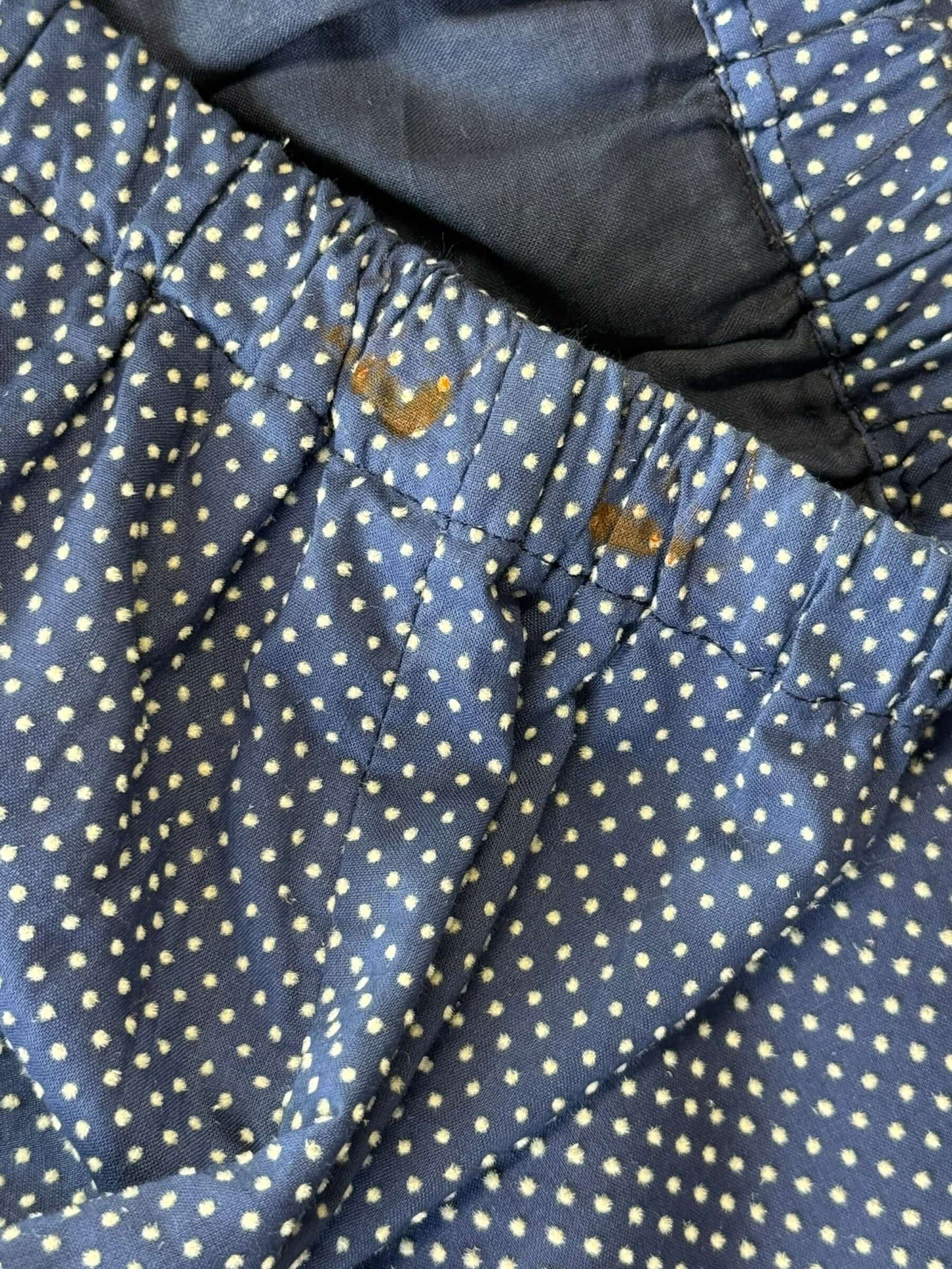 Rust on skirt of 1950s Navy Blue Swiss Dot Set S