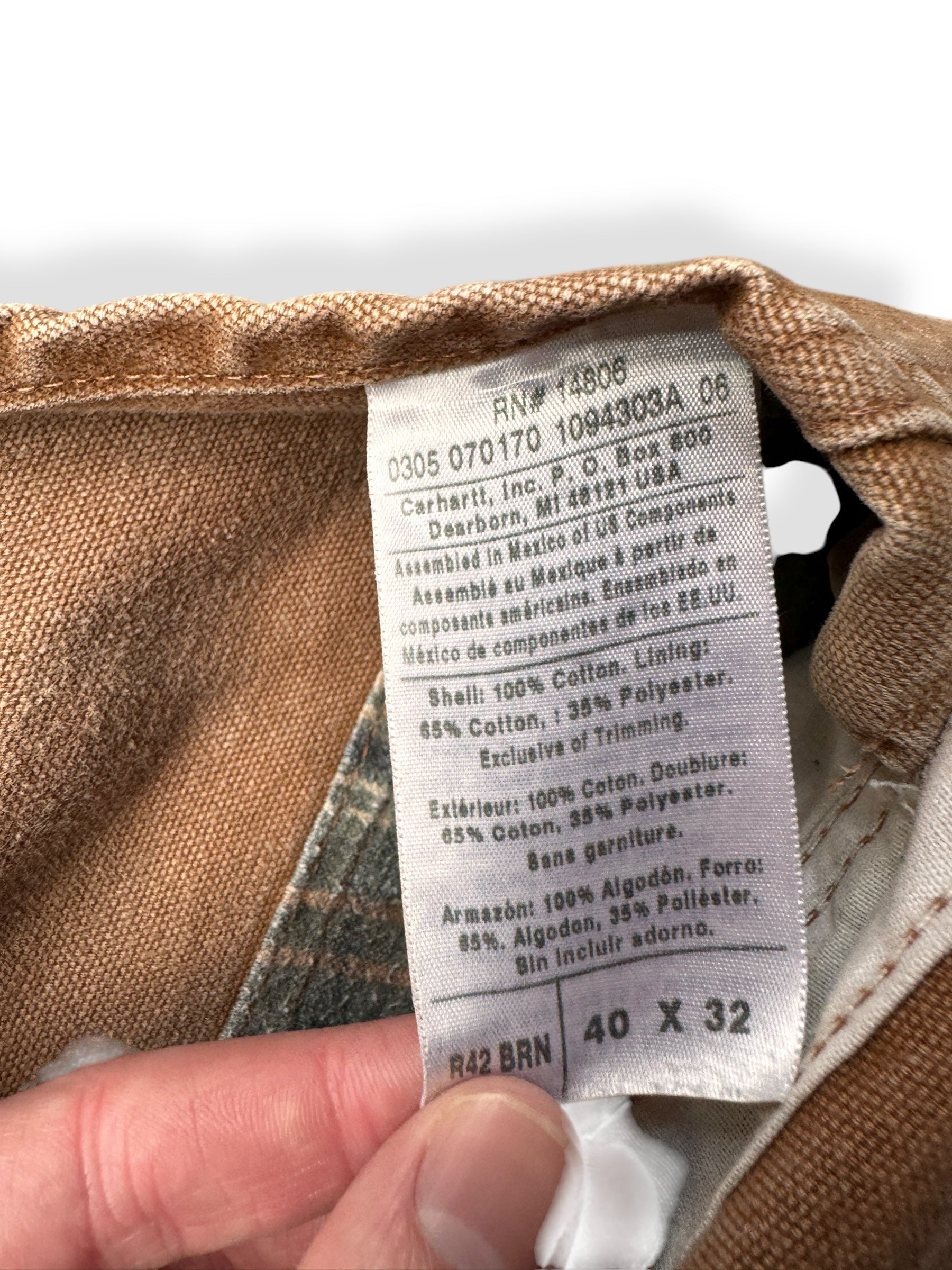 Tag on Carhartt Flannel Lined Bib Overalls W44
