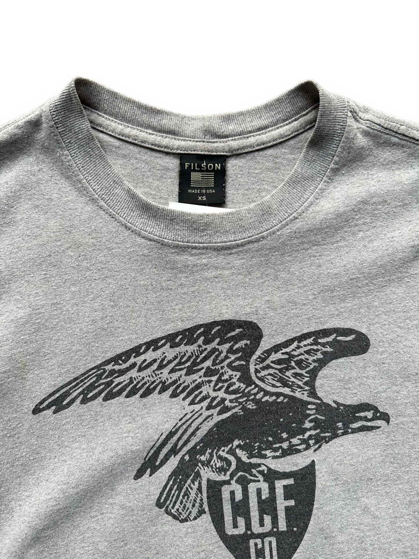 Tag View of Grey Filson Eagle Graphic Tee SZ XS | Barn Owl Vintage Goods | Vintage Filson Workwear Seattle