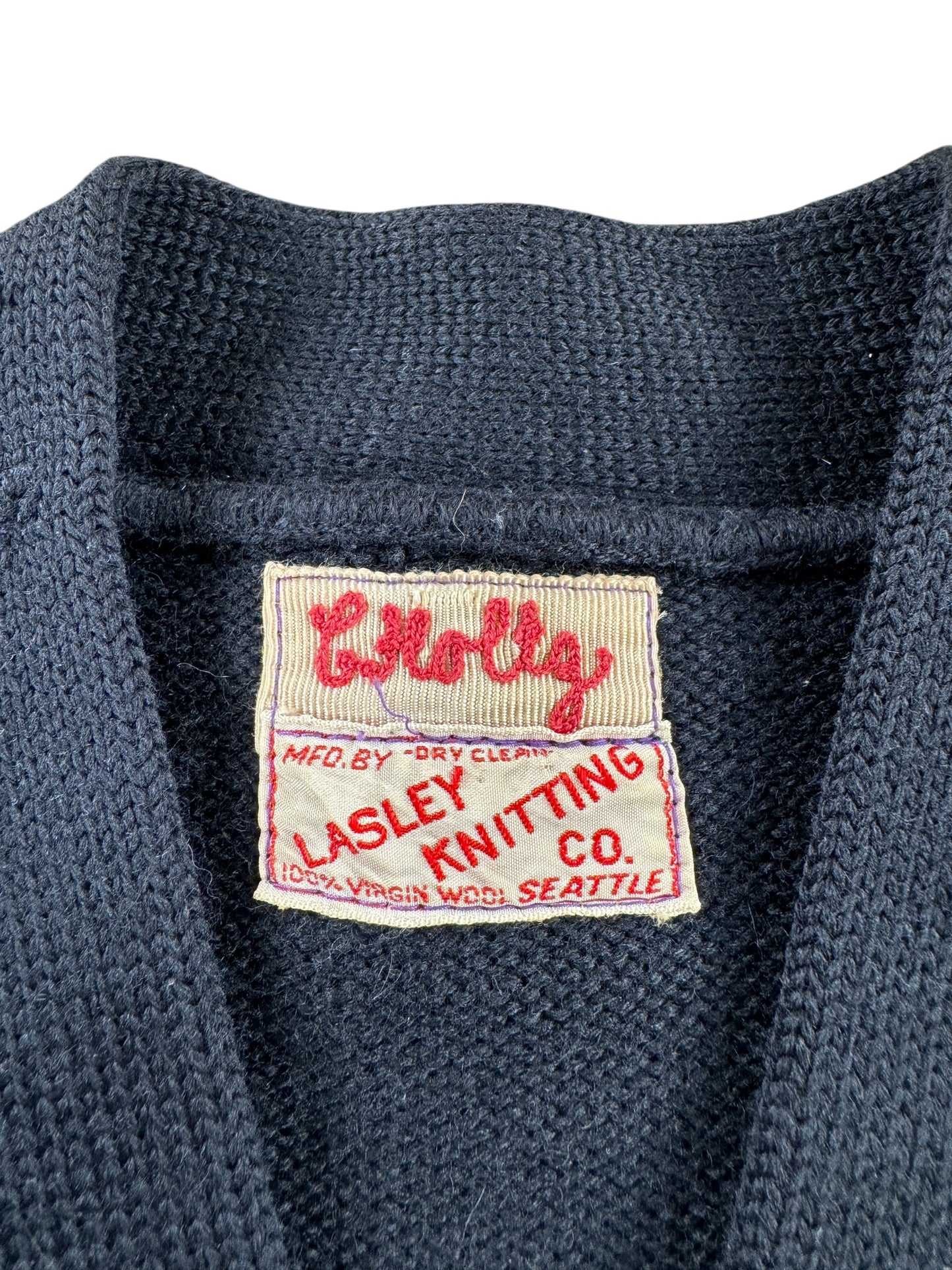 Tag on Vintage UW Lasley Woolen Mills Chuck Holtz Cardigan SZ L