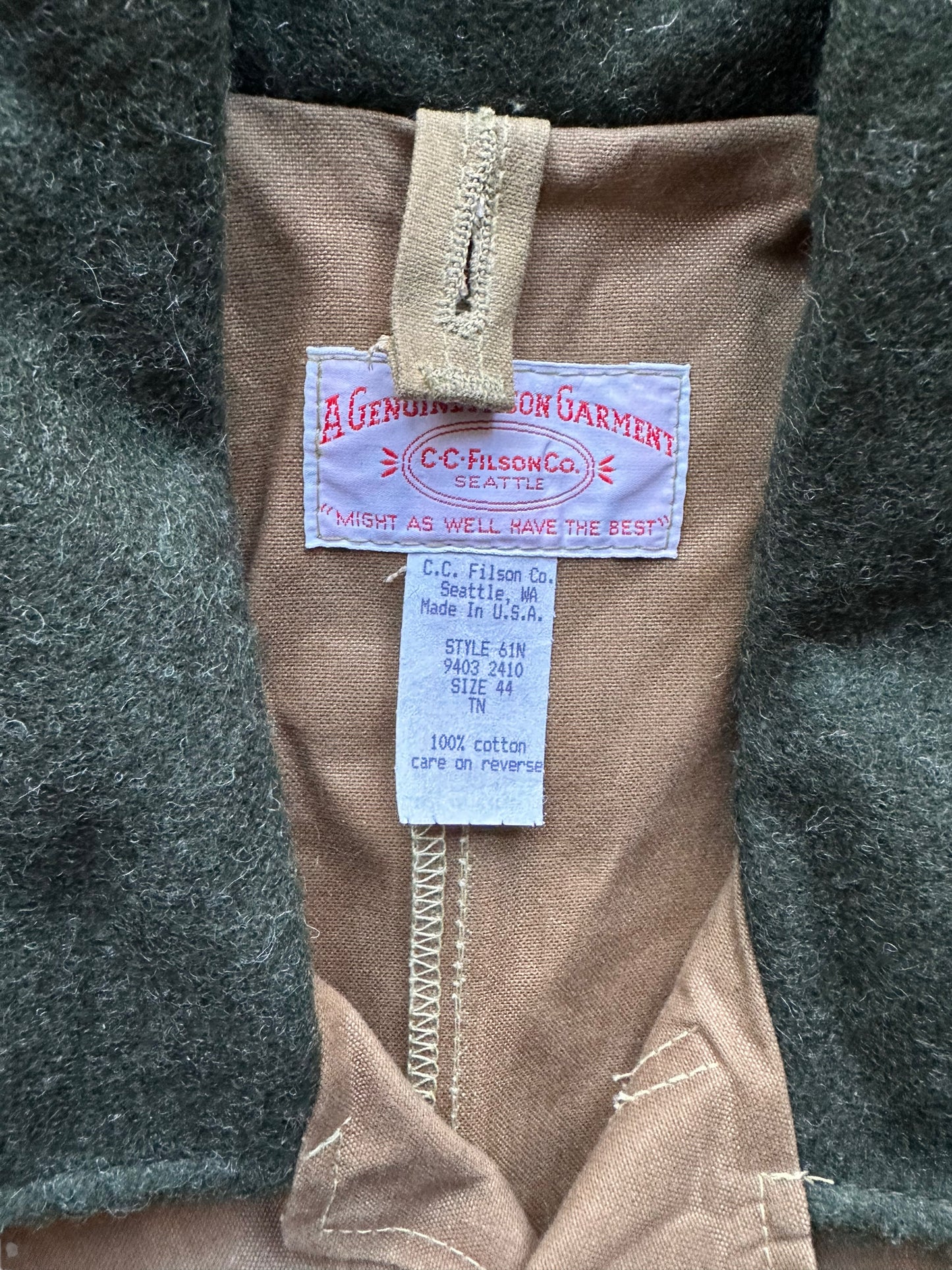 Tag View on Vintage NOS Filson Tin Cloth Packer Coat SZ 44 | Barn Owl Vintage Goods Filson | Vintage Filson Workwear Seattle