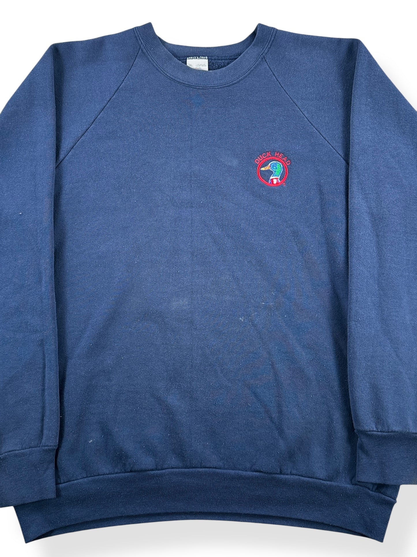 Front Close Up of Vintage Duck Head Blue Crewneck SZ L