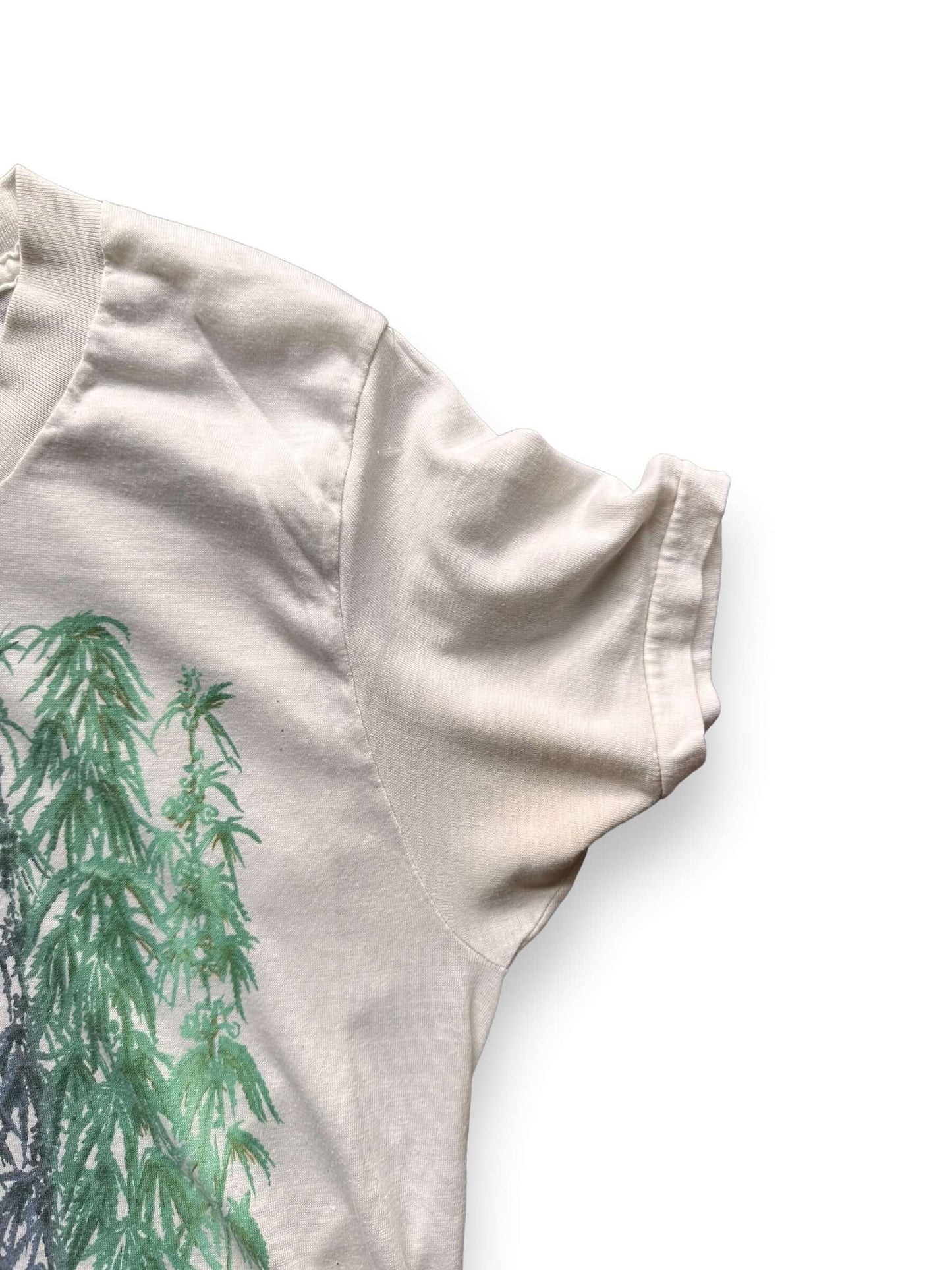 left sleeve of Vintage 70s Era "Blossom" Weed Tee SZ S | Vintage Weed Tee Seattle | Barn Owl Vintage