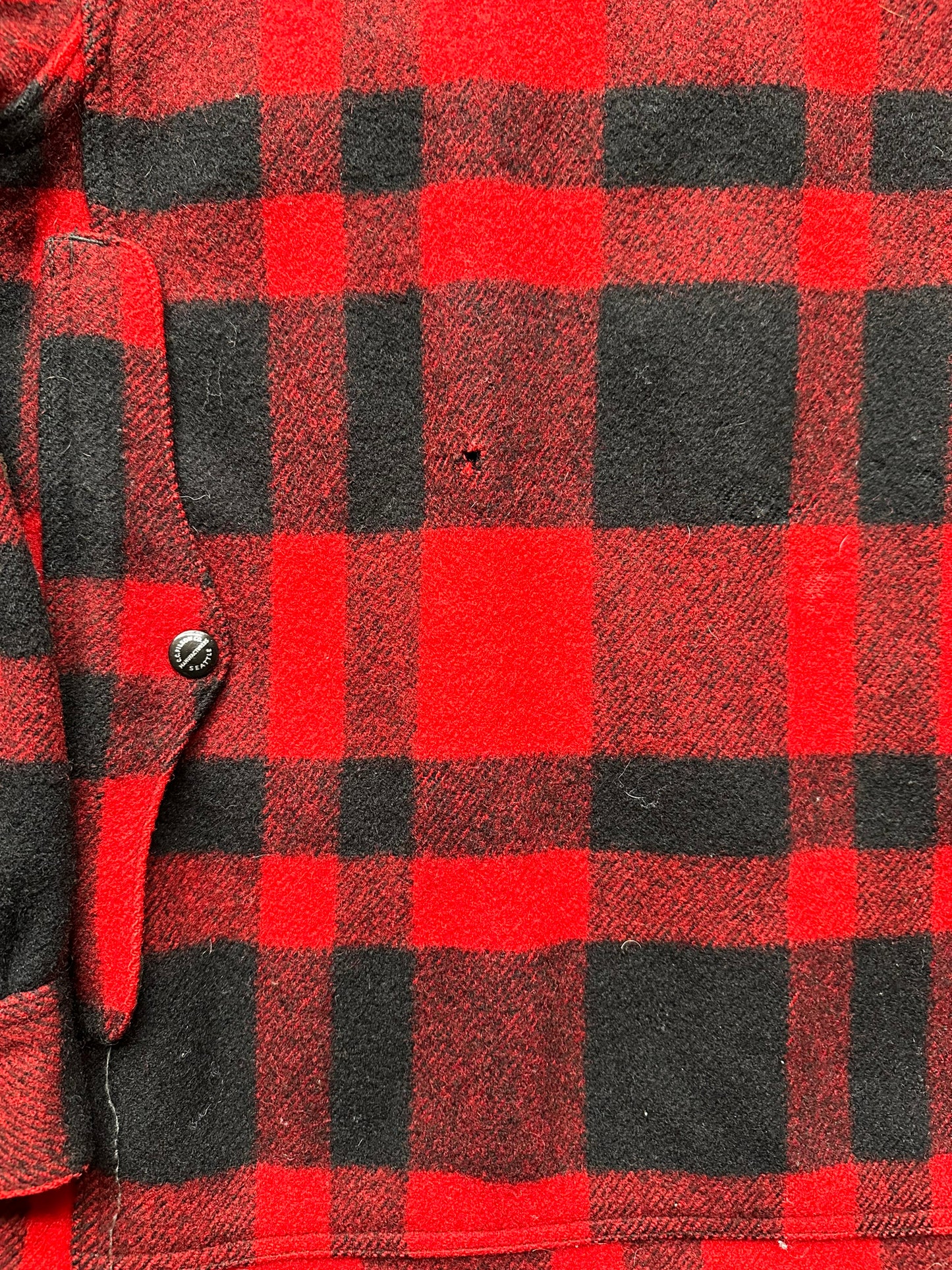 small nibble on back of Vintage 40s/50s Era Filson Union Made Cruiser SZ 36 | Barn Owl Vintage Goods | Vintage Filson Workwear Seattle