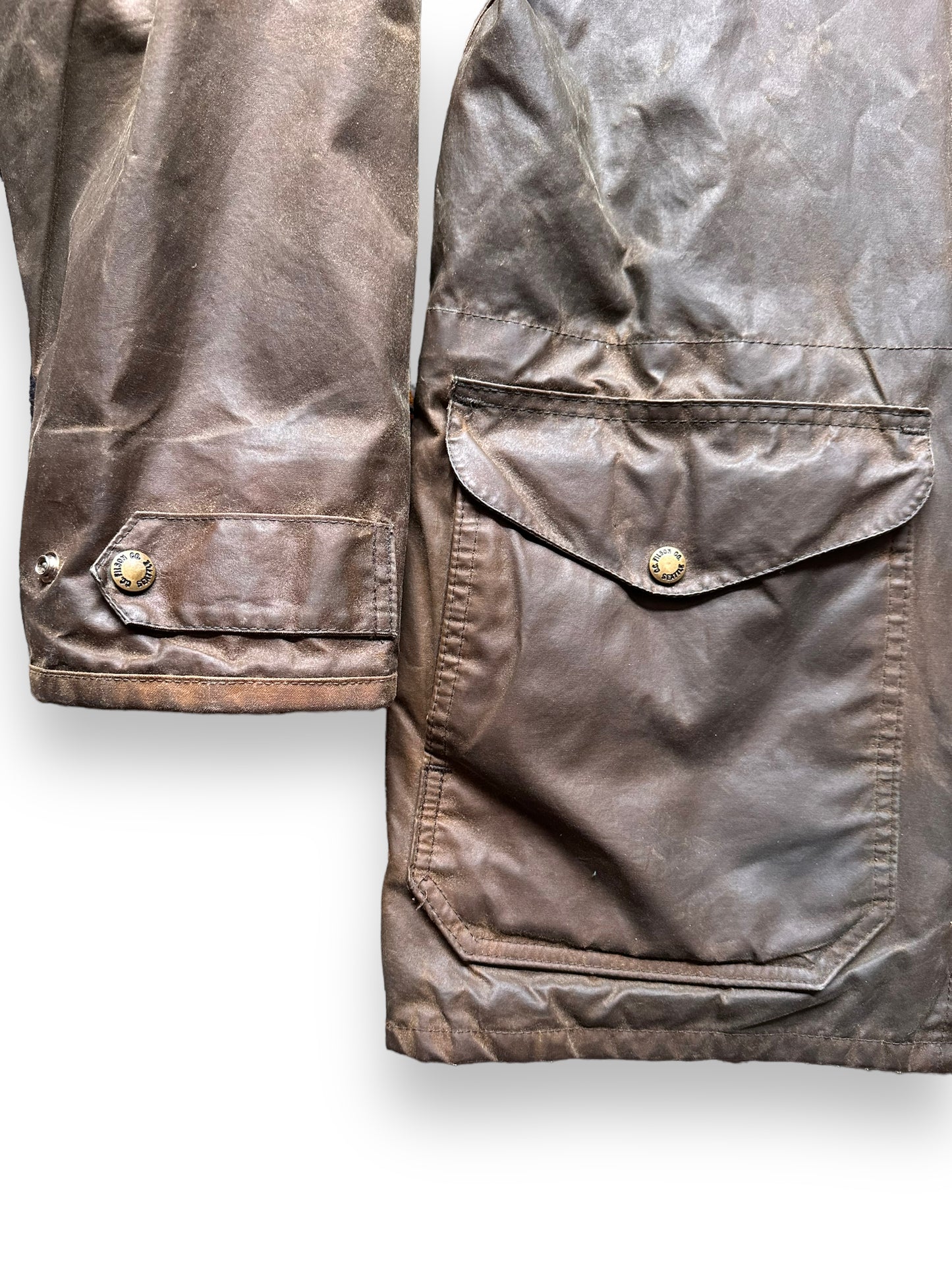 front right pocket and cuff on Vintage Filson Waxed Jacket SZ L | Barn Owl Vintage Goods | Vintage Filson Workwear Seattle