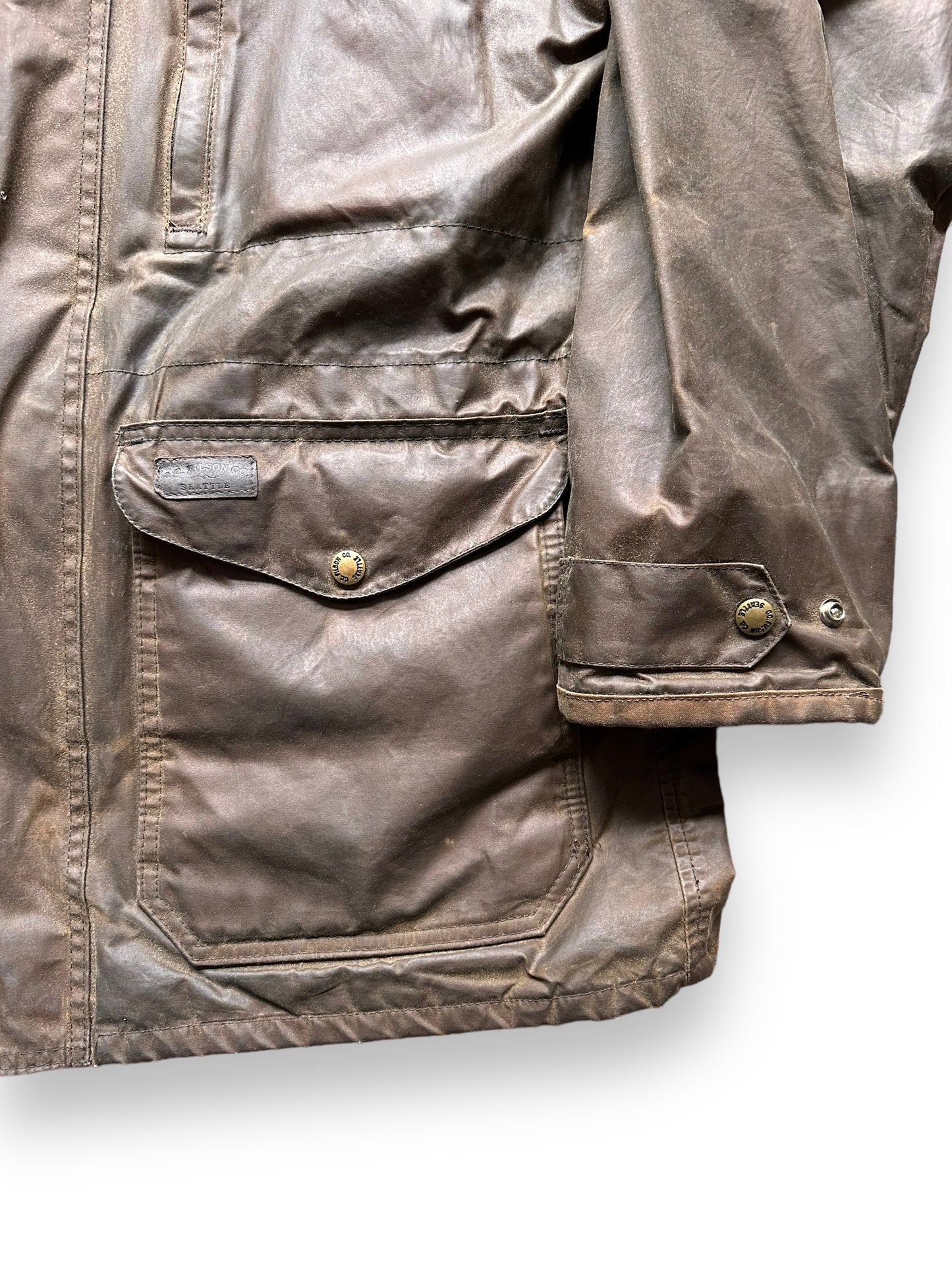 front left pocket and cuff on Vintage Filson Waxed Jacket SZ L | Barn Owl Vintage Goods | Vintage Filson Workwear Seattle