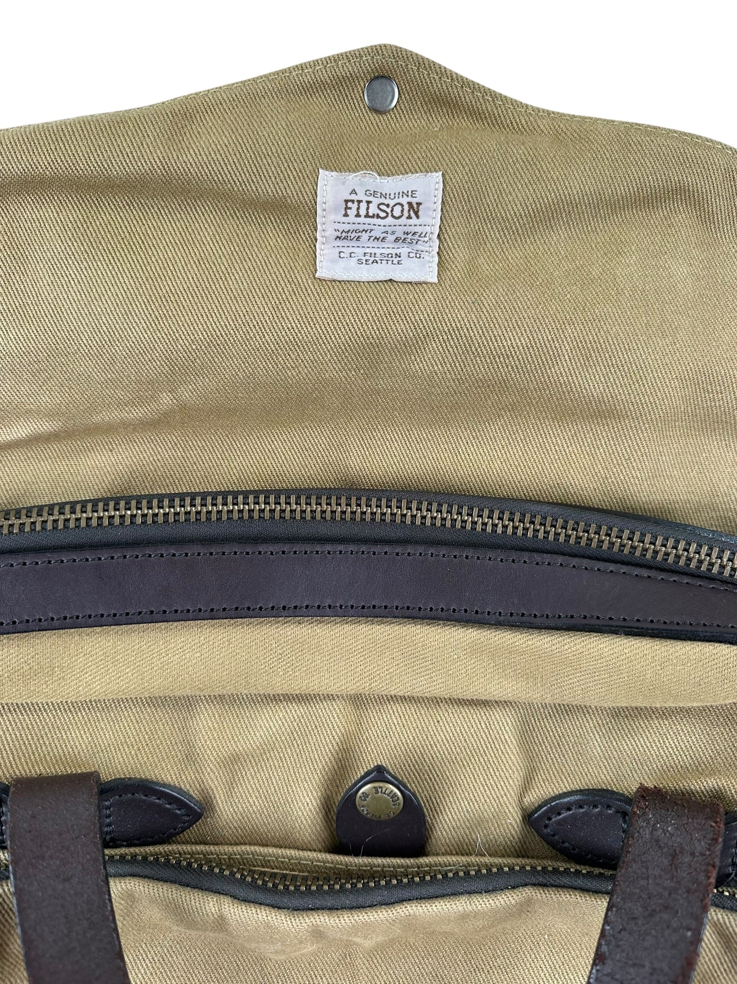 Filson Tag on Filson Rugged Twill Padded Computer Bag Style 258