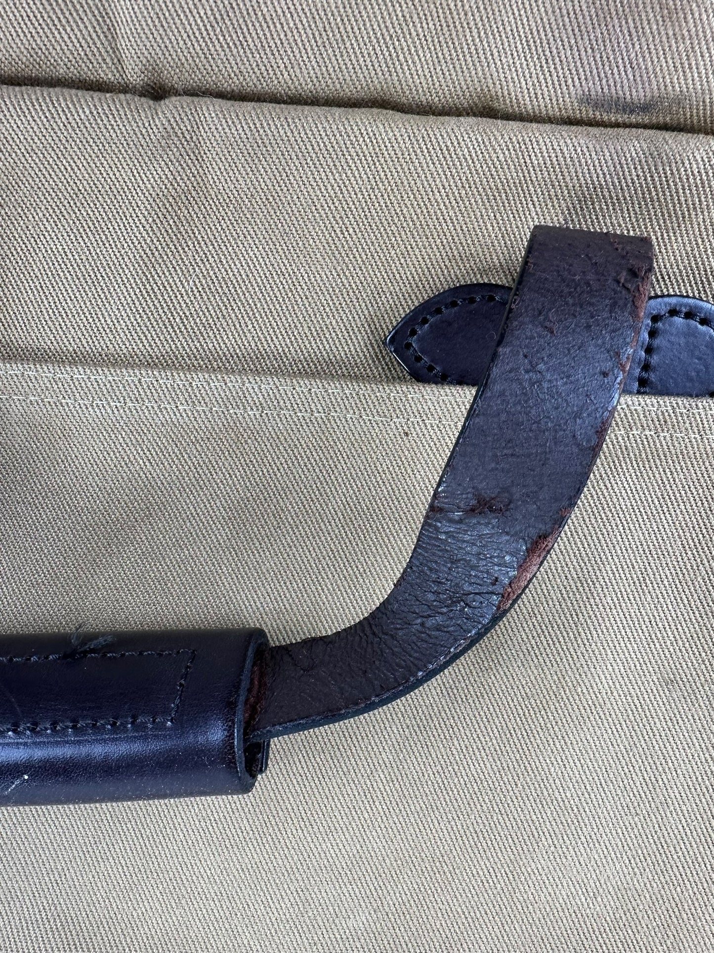 Scuffing on Straps of Filson Rugged Twill Padded Computer Bag Style 258