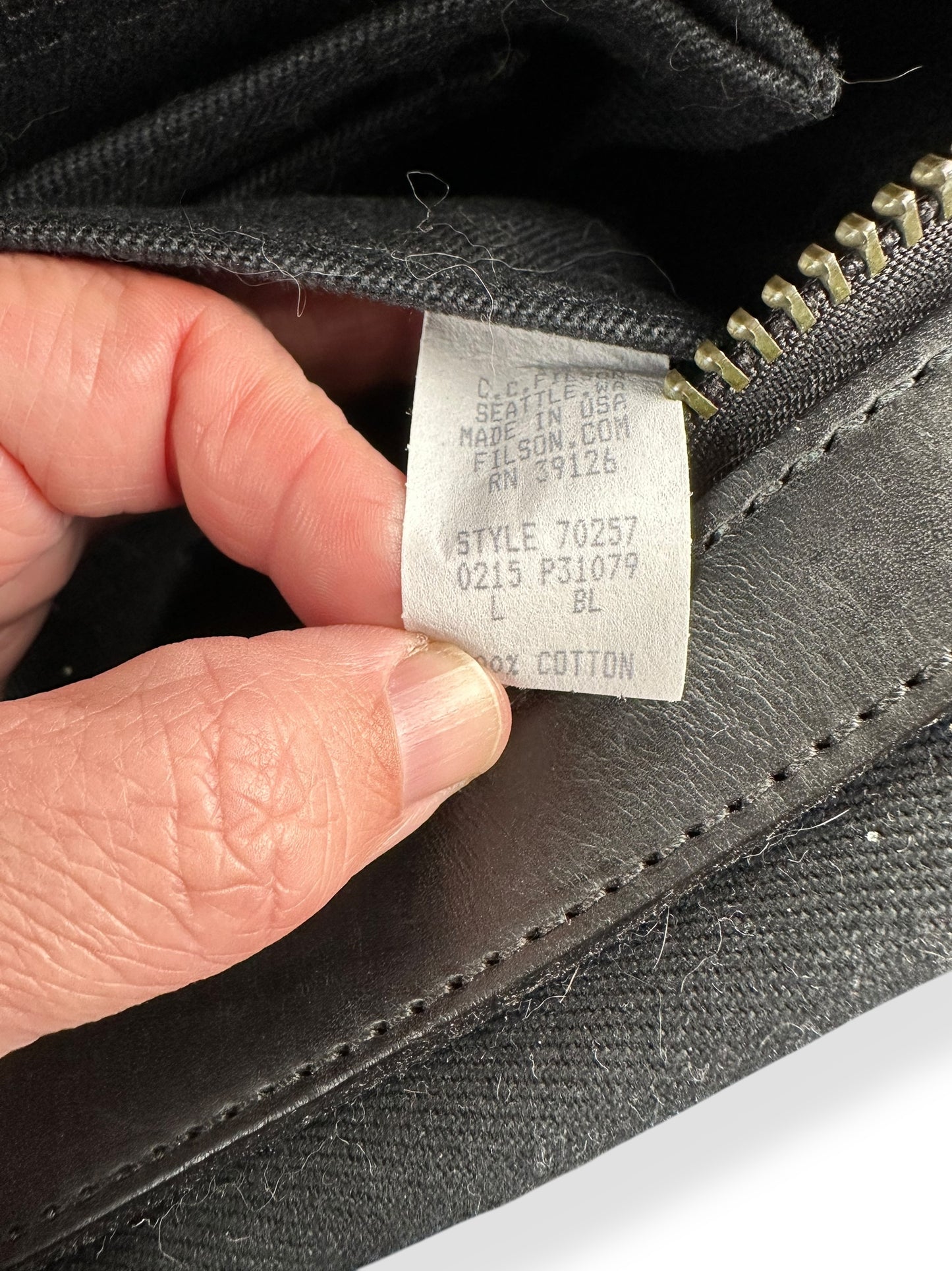 Production Tag on Filson Black 257 Briefcase