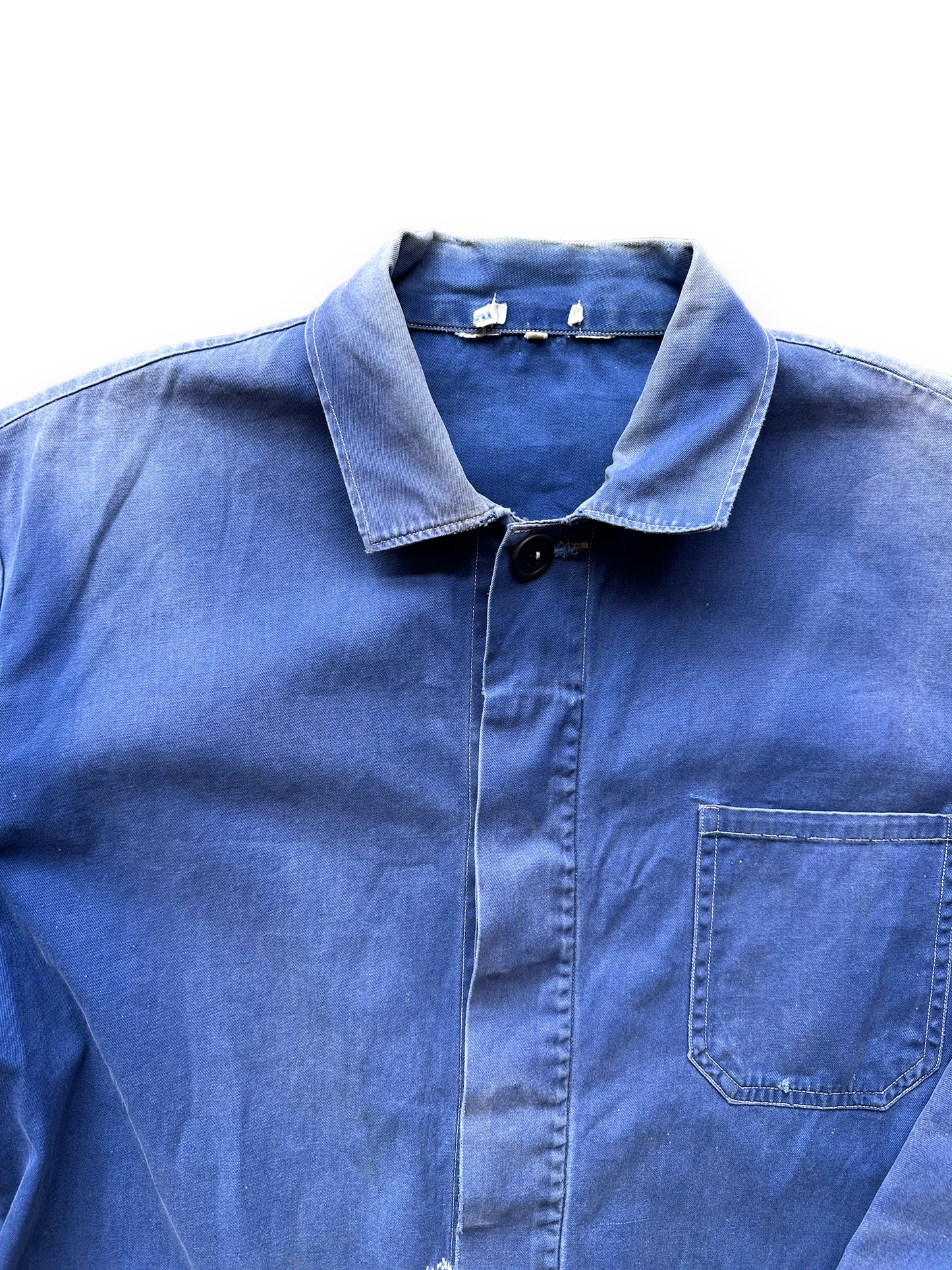 Upper Front View of Vintage Faded French Workwear Chore Coat SZ L | Vintage European Workwear Seattle | Barn Owl Vintage Goods Seattle