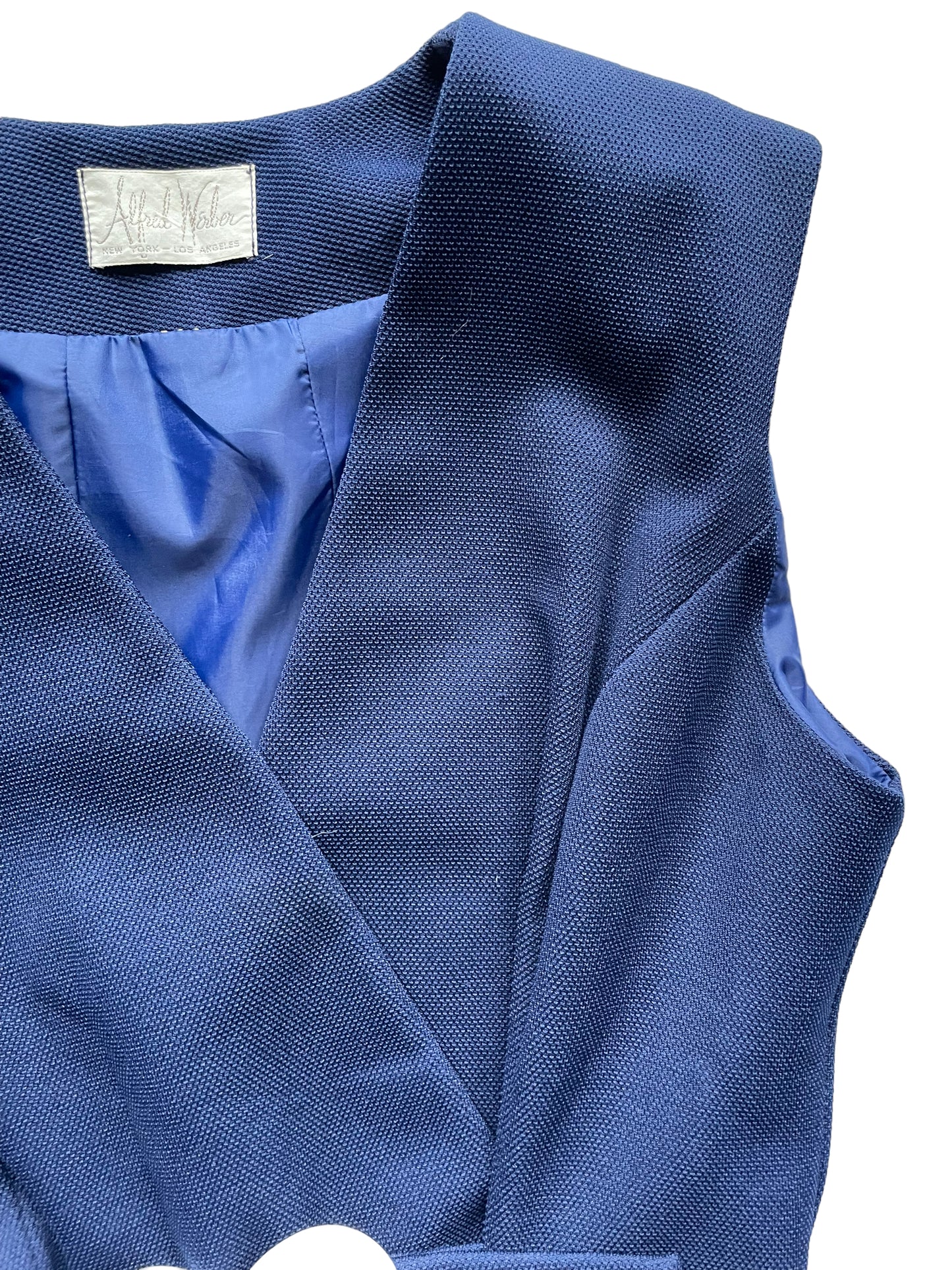 Front left side view of Vintage 1960s Alfred Werber Long Heart Belted Vest