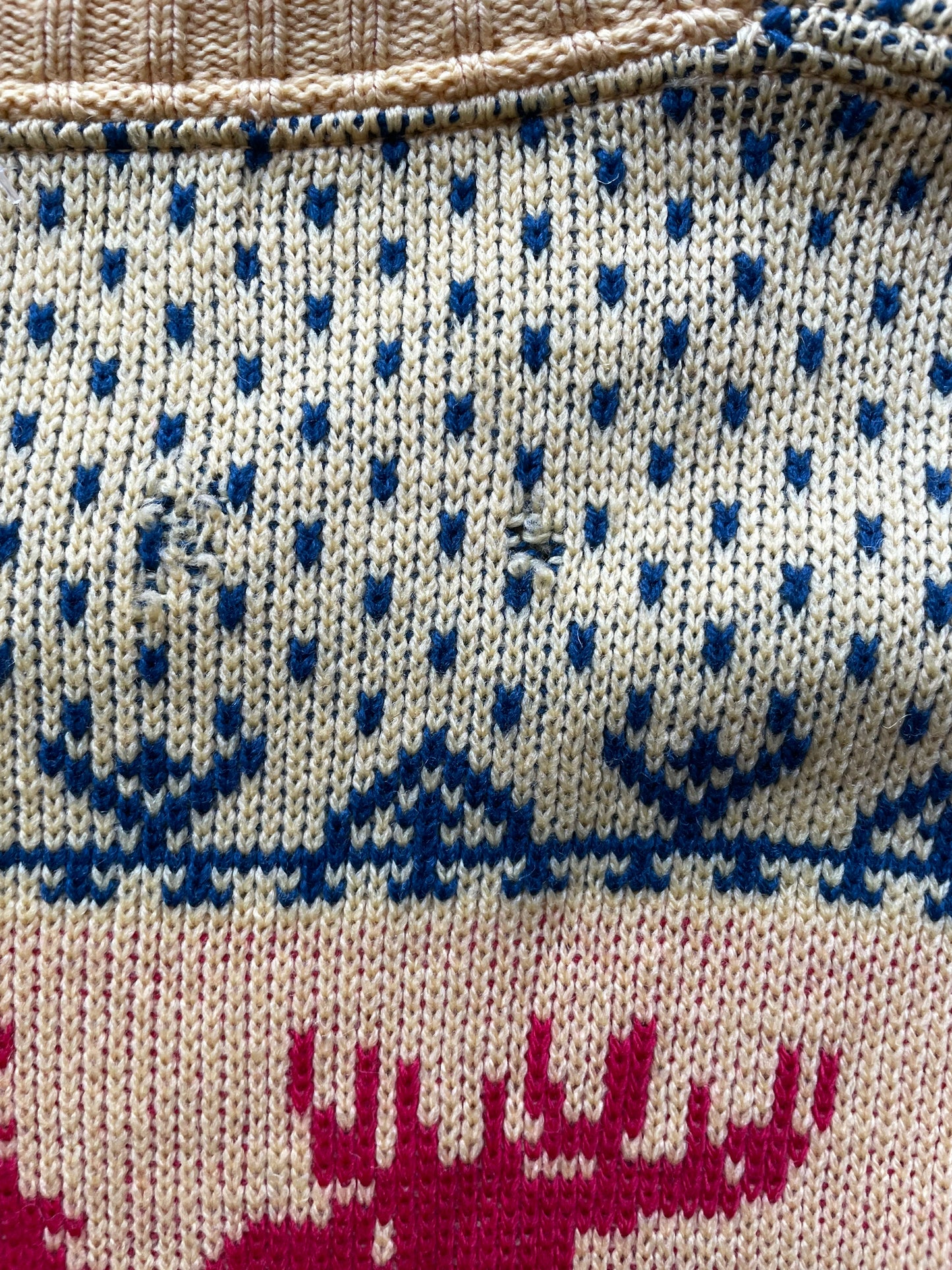 Upper back view of snags Vintage 1940s Black Bros Ski Sweater