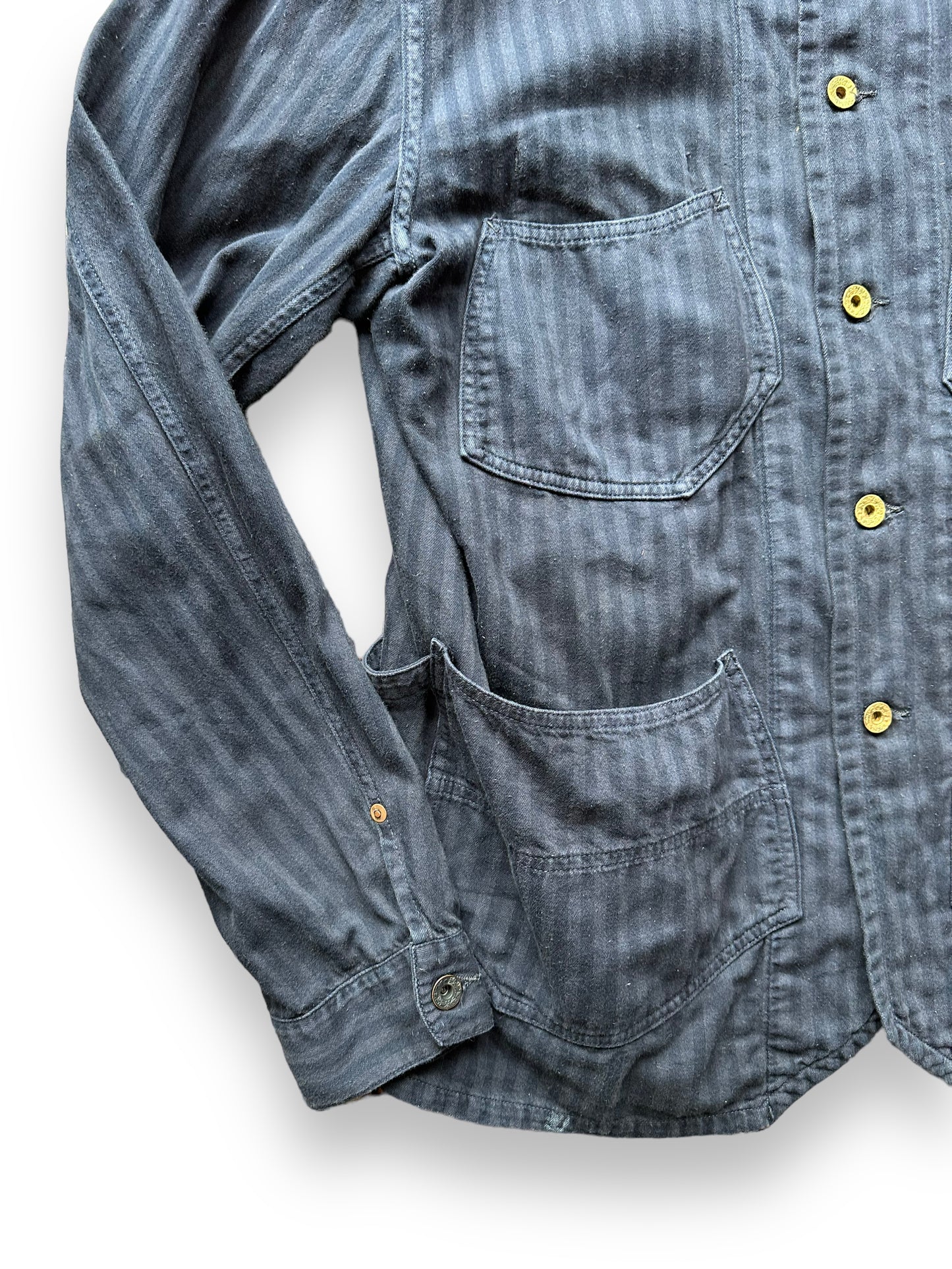 Lower Front Right View of Sugarcane Reproduction Herringbone Twill Chore Coat SZ L | Vintage European Workwear Seattle | Barn Owl Vintage Goods Seattle