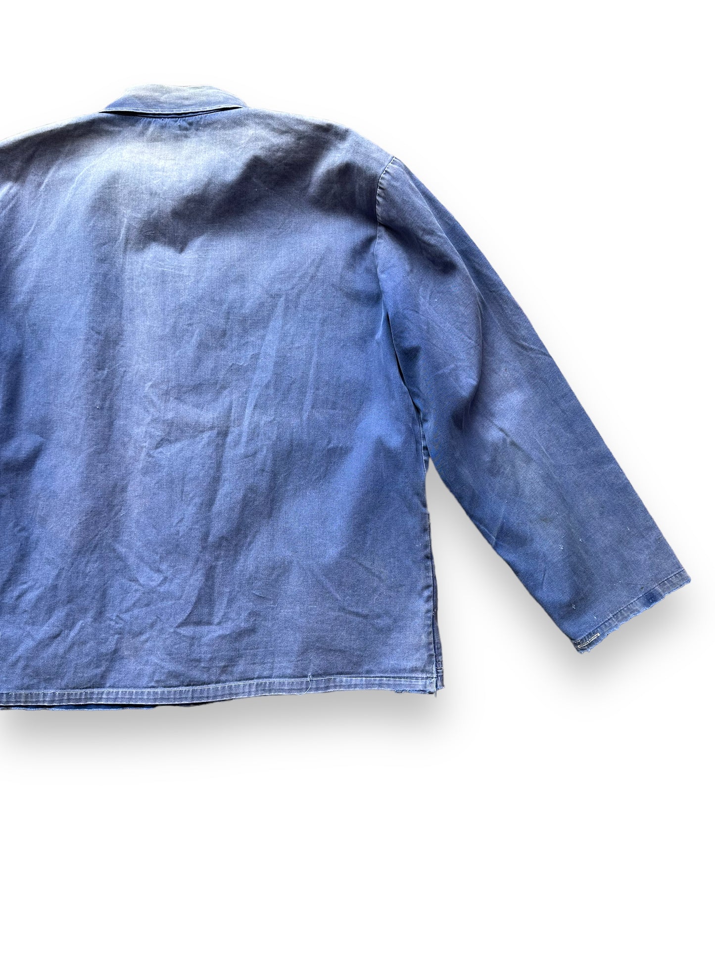 Rear Right View of Vintage Faded French Workwear Chore Coat SZ L | Vintage European Workwear Seattle | Barn Owl Vintage Goods Seattle