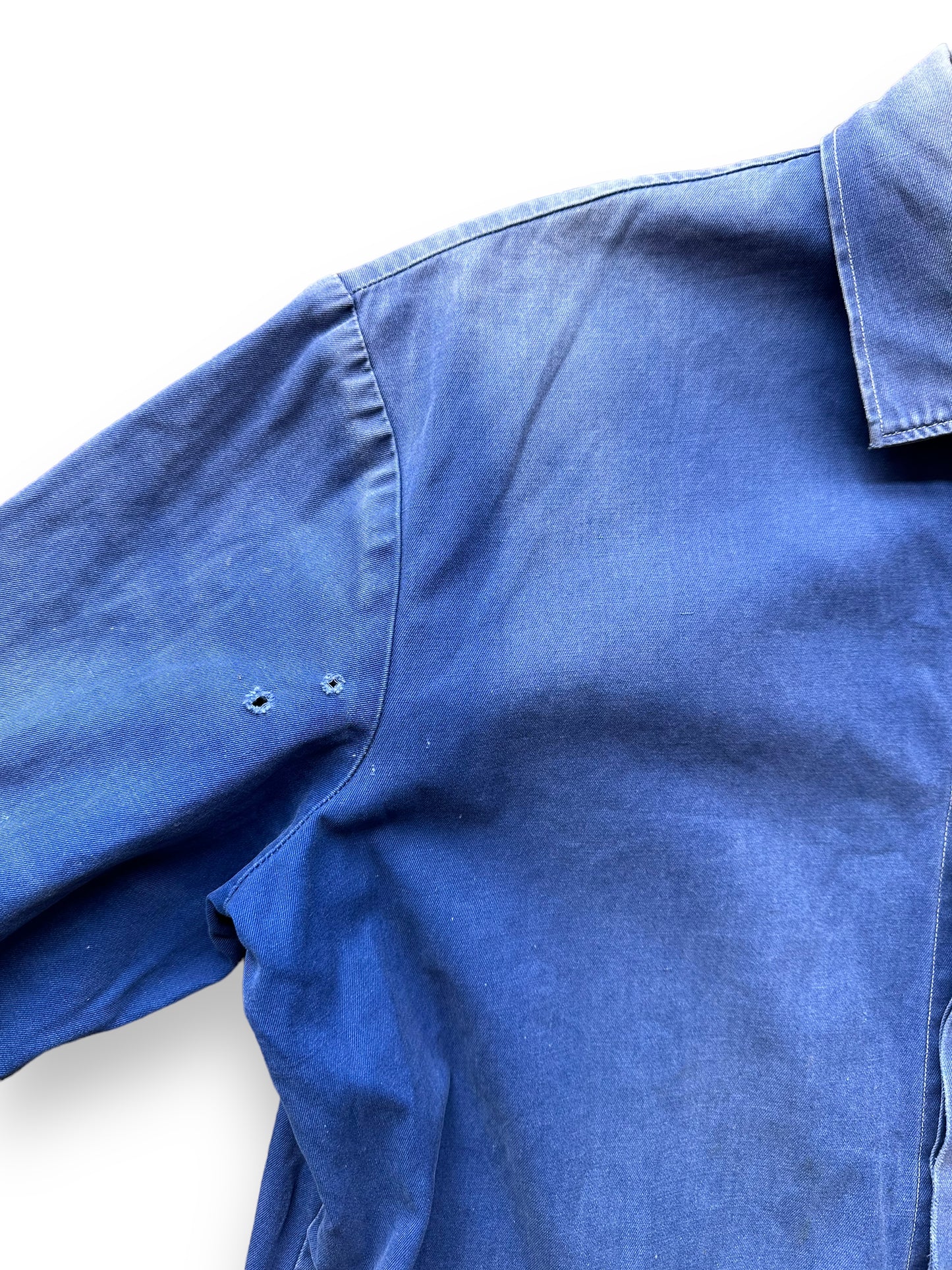 Small Holes in Upper Right Shoulder on Vintage Faded French Workwear Chore Coat SZ L | Vintage European Workwear Seattle | Barn Owl Vintage Goods Seattle