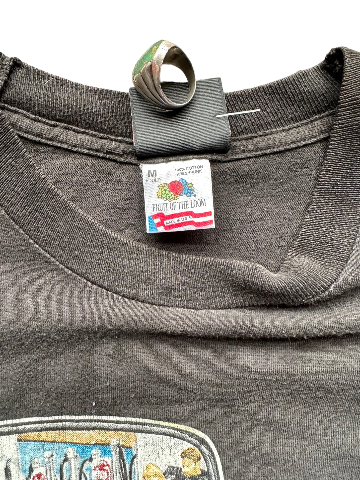 Tag close up of Vintage Harley Davidson Get a Grip Pocket Tee SZ M | Vintage Harley Tee | Barn Owl Vintage Seattle