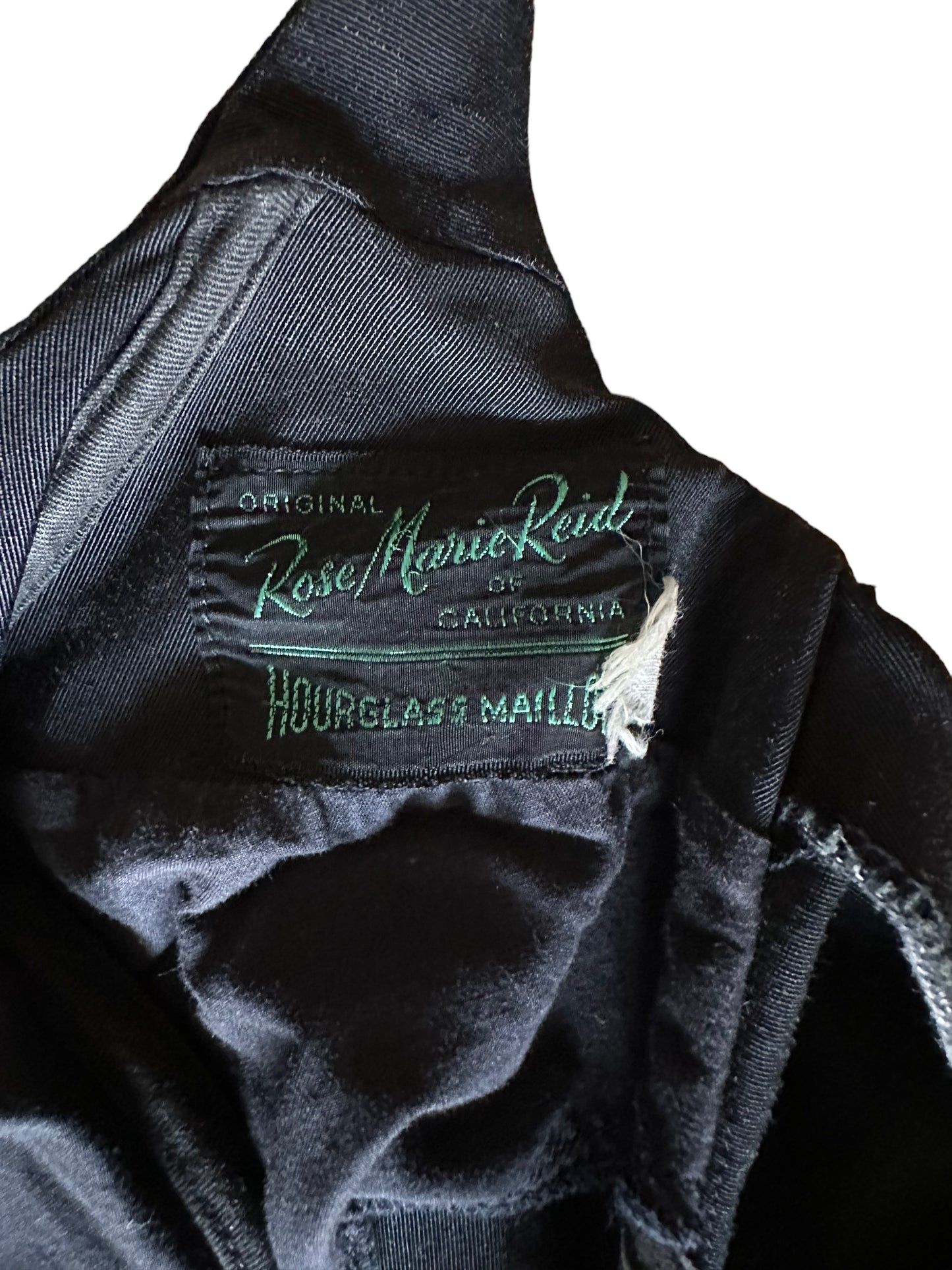 Tag view of Vintage 1950s Rose Marie Reid Hourglass Malliot | Seattle Vintage Swimwear | Barn Owl Ladies Vintage