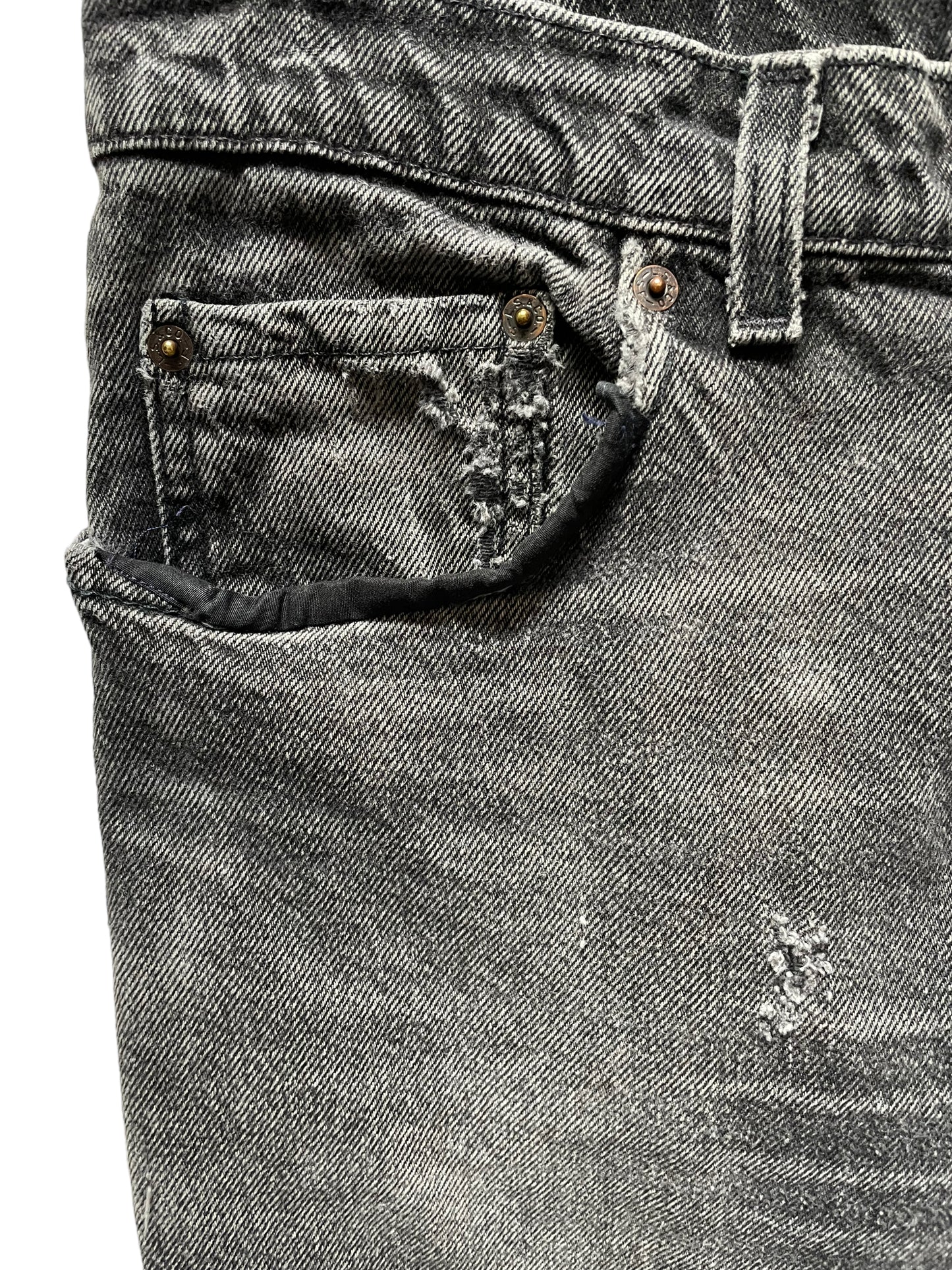 Mended front right pocket view of Vintage USA Mended Black Levi's 550s 33x34