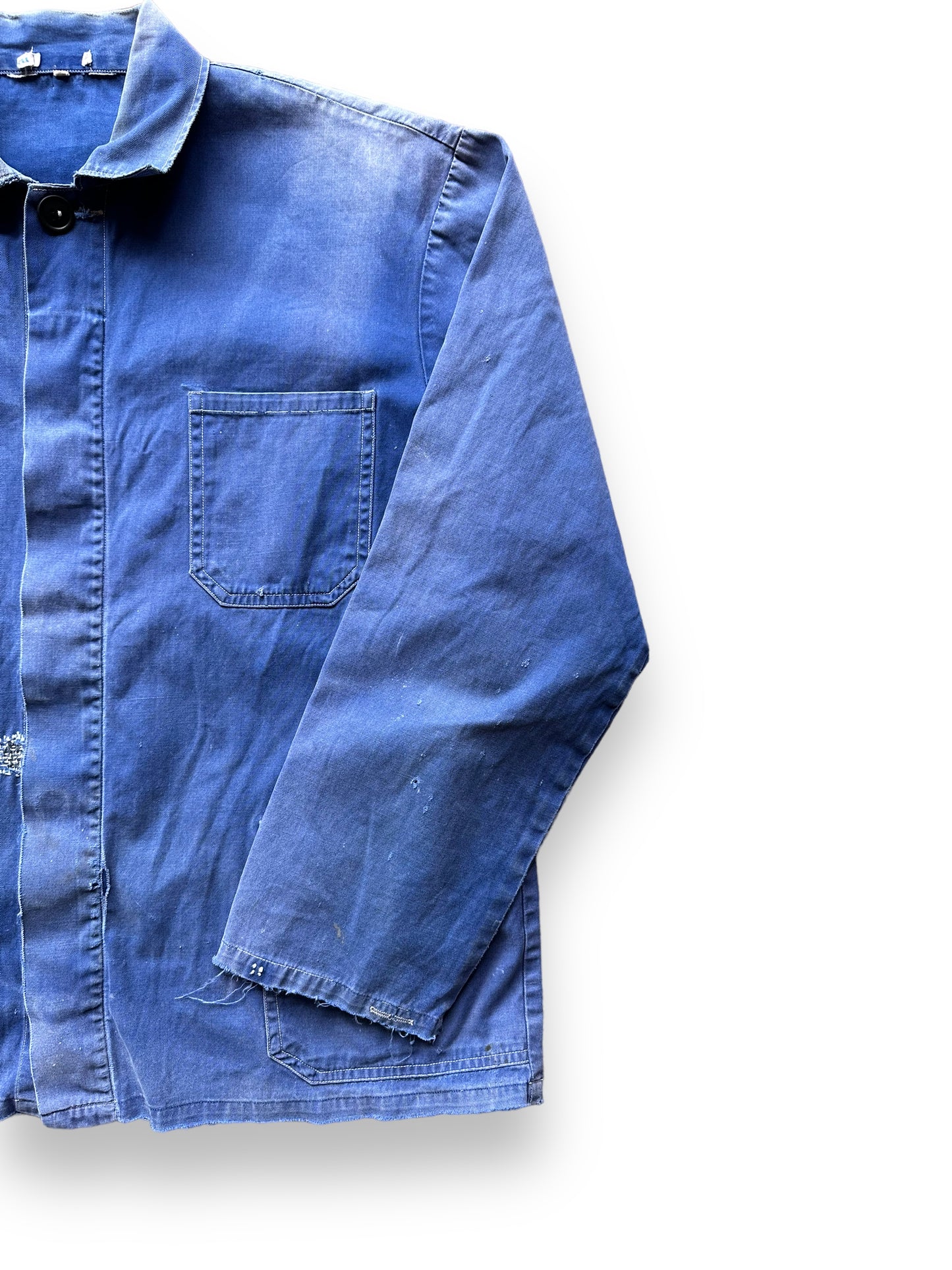 Front Left View of Vintage Faded French Workwear Chore Coat SZ L | Vintage European Workwear Seattle | Barn Owl Vintage Goods Seattle