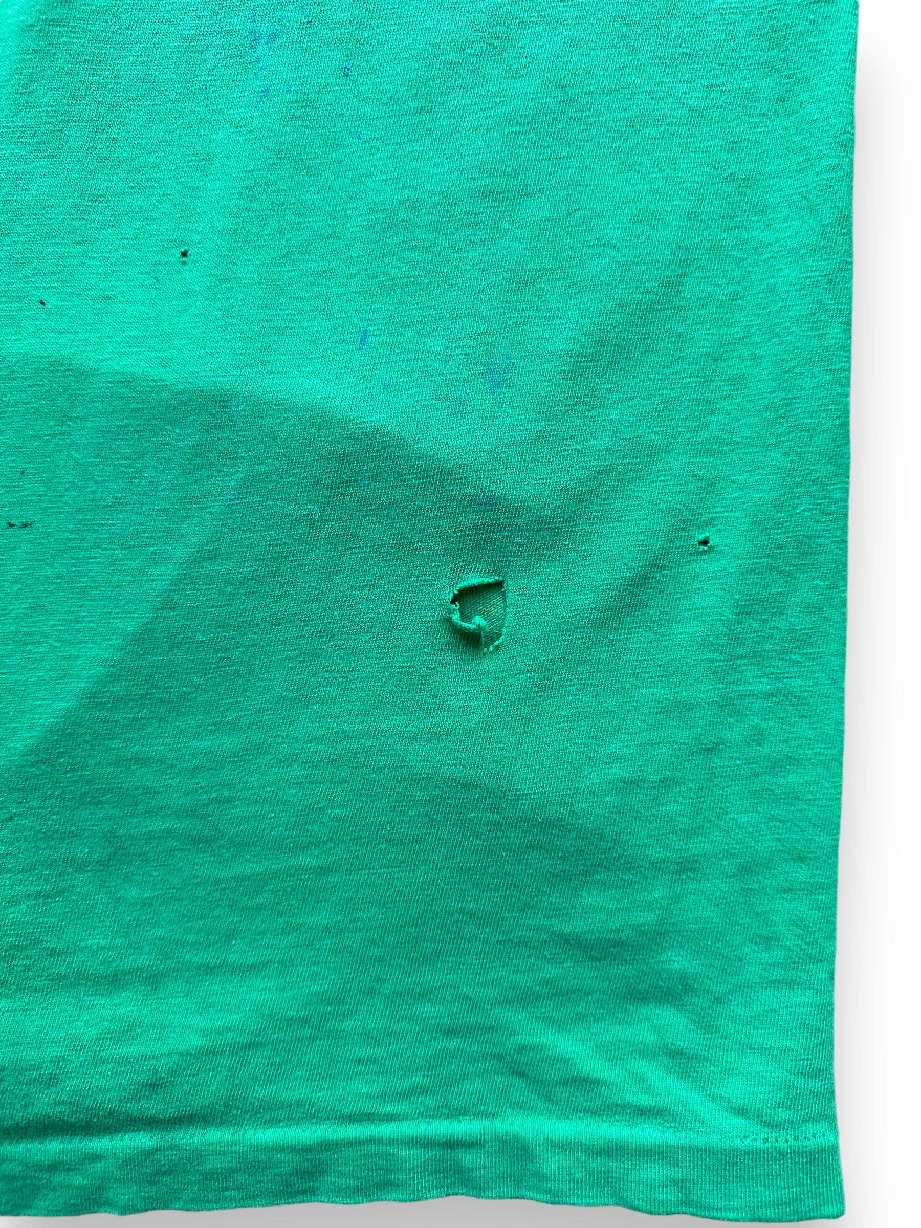 Hole on front left of Vintage Distressed Seafood Restaurant Tee SZ M |  Vintage Fishing Tee Seattle | Barn Owl Vintage