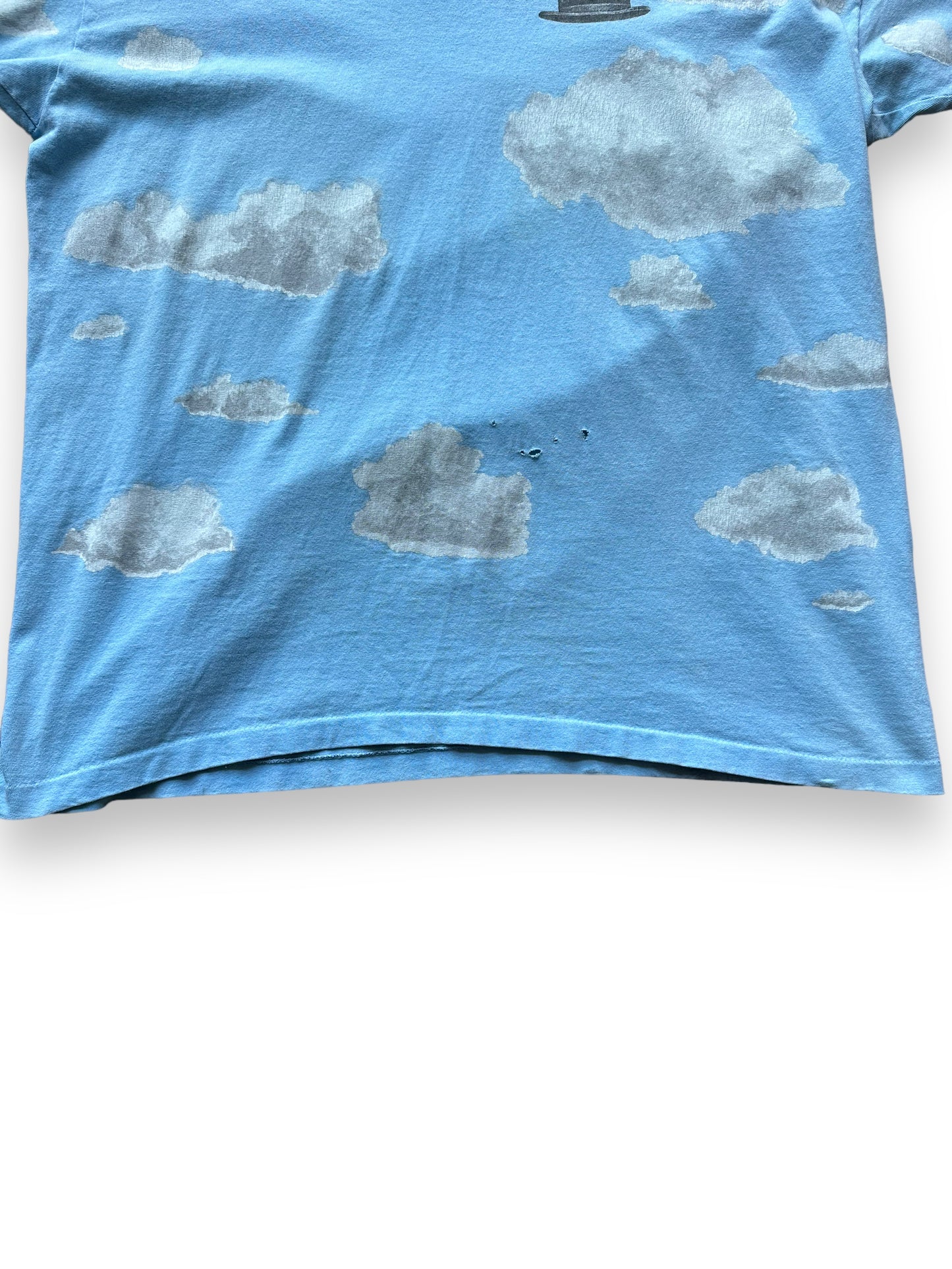 Front bottom of Vintage René Magritte AOP Tee SZ XL | Vintage Art Tee Seattle | Barn Owl Vintage