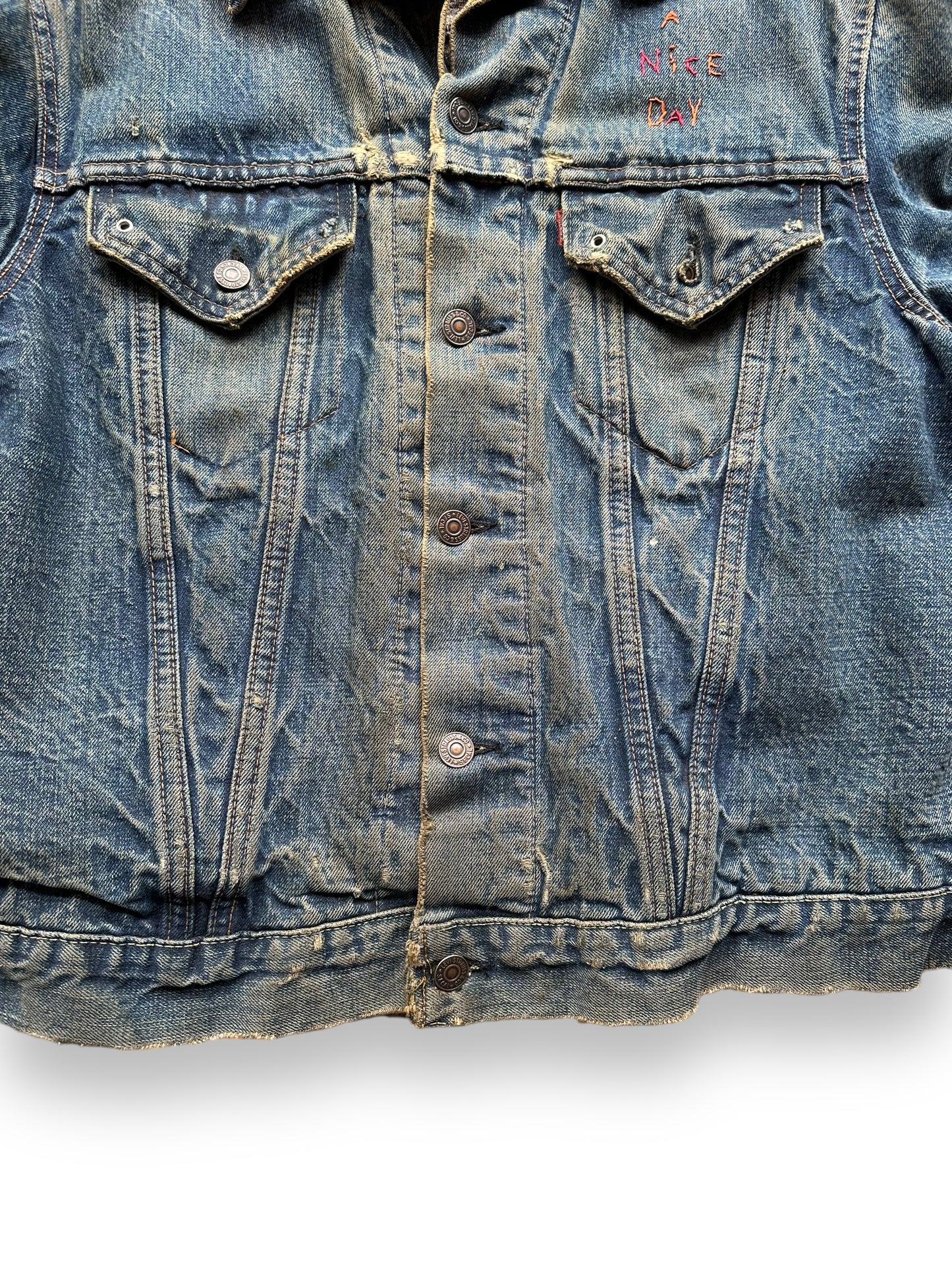 Bottom front of Levi's Big E Type III Blanket Lined Trucker w/ Butterfly Embroidery SZ 42 | Vintage Denim Workwear Seattle | Seattle Vintage Denim
