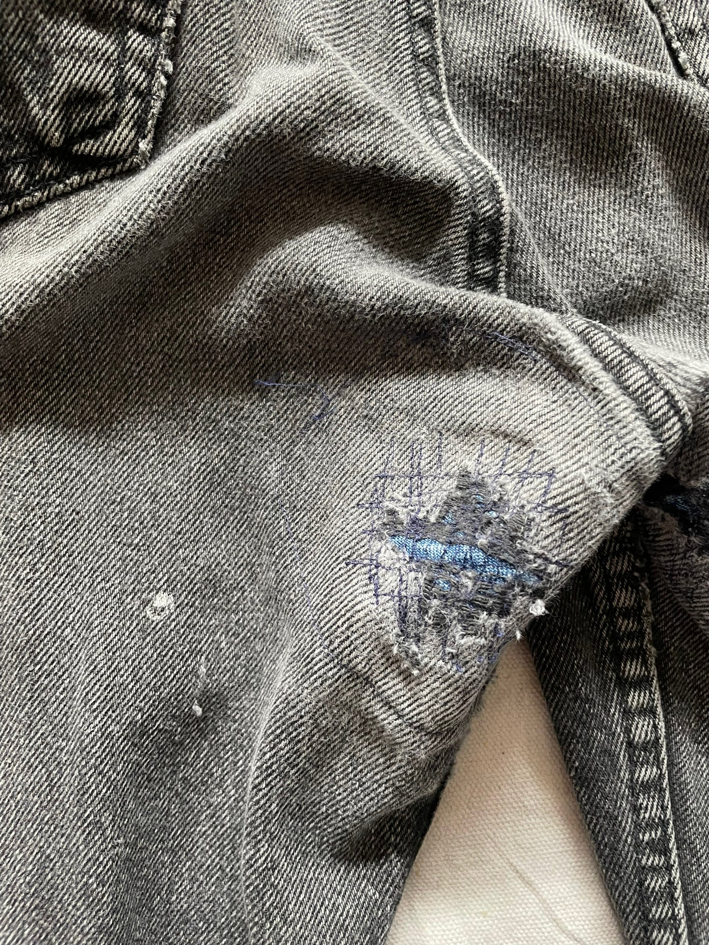Mended crotch view of Vintage USA Mended Black Levi's 550s 33x34