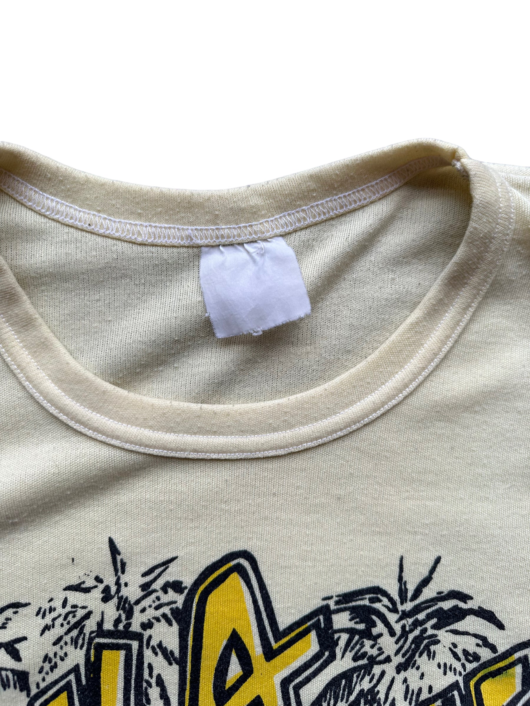 Faded Tag View of Vintage Bula Fiji Yellow Graphic Tee SZ L | Vintage T-Shirts Seattle | Barn Owl Vintage Tees Seattle