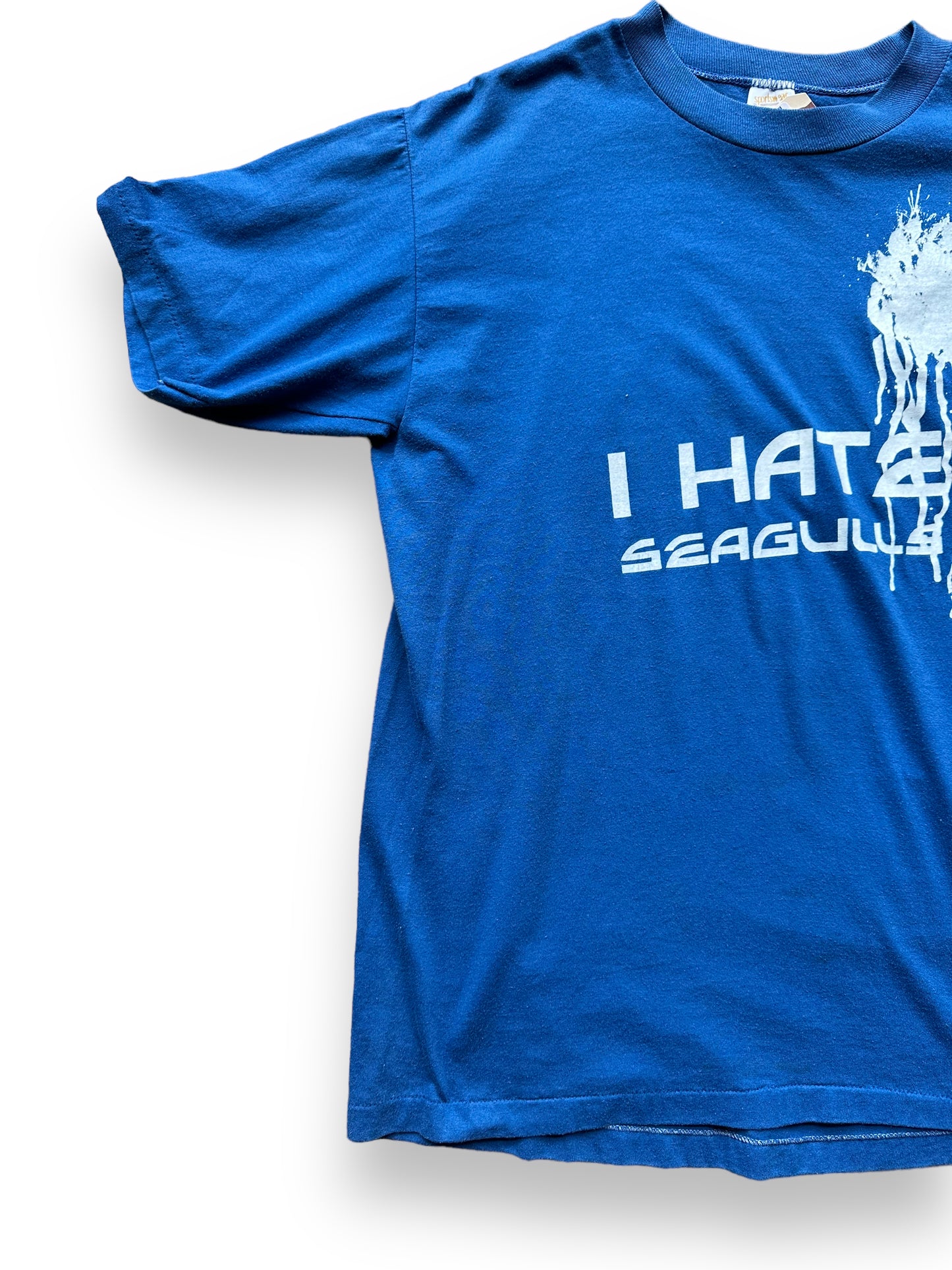 Front right shot of Vintage Blue I Hate Seagulls Tee SZ L | Vintage T-Shirts Seattle | Barn Owl Vintage Tees Seattle