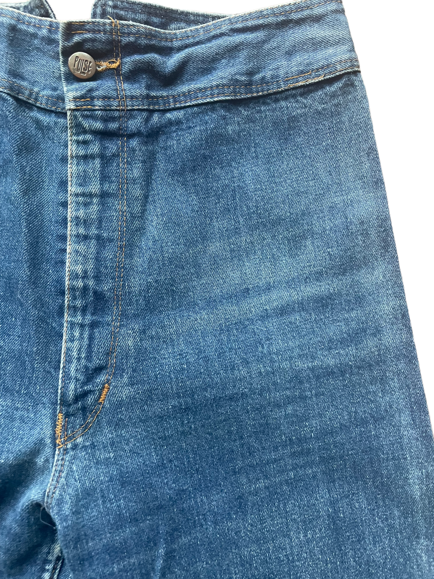 Front left side waist view of Vintage 1970s Pulse By Aero Wide Leg Buckle Back Jeans | Barn Owl Seattle | Vintage Buckle Back Jeans