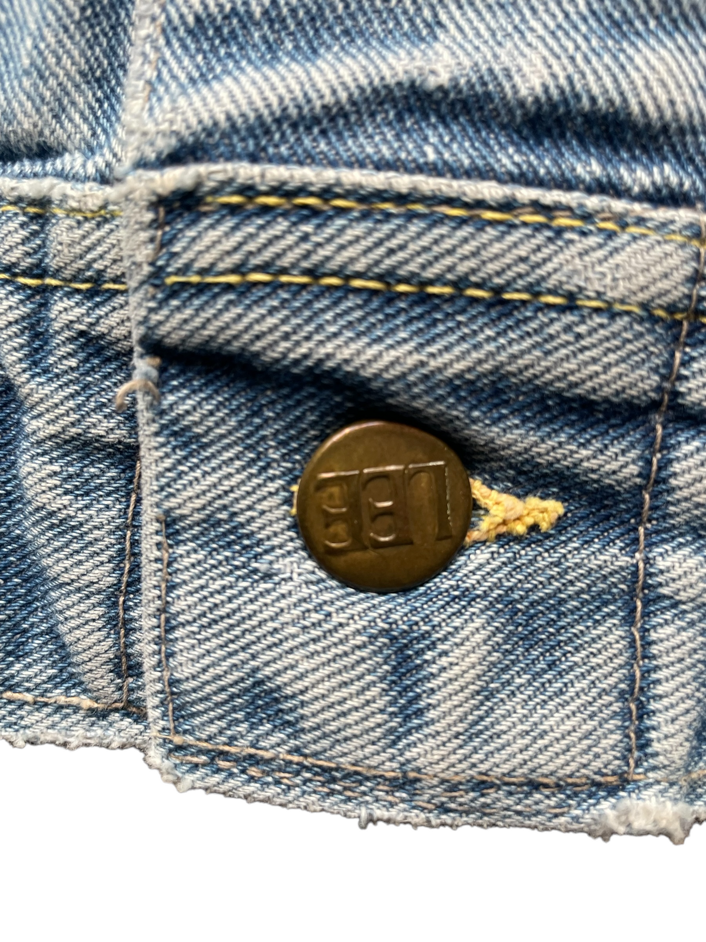 Close up of button on the Vintage Lee Jacket. Seattle Vintage Clothing.