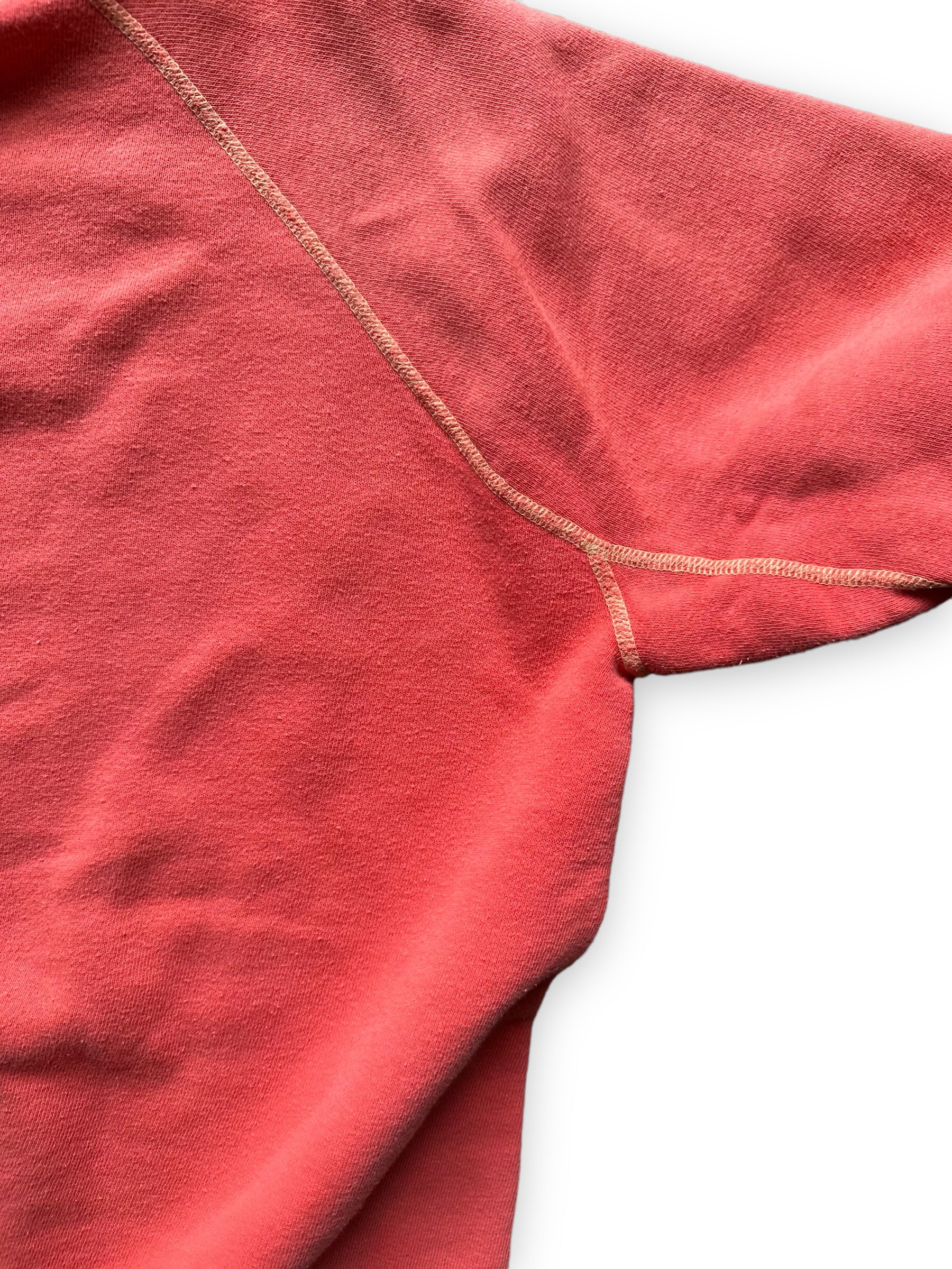 Right Gusseted Sleeve View of Vintage Faded Red Crewneck Sweatshirt | Vintage Crewneck Sweatshirt Seattle | Barn Owl Vintage Clothing
