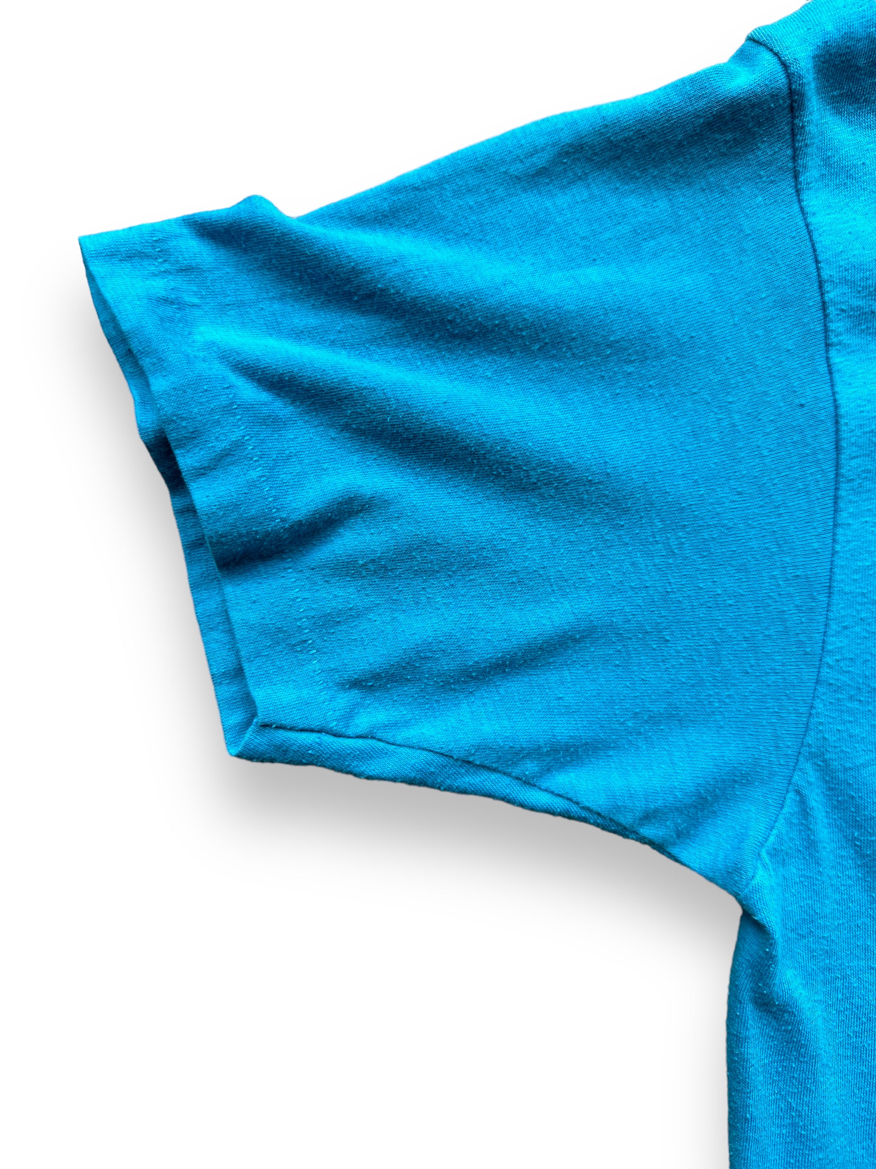 Right sleeve close up of Vintage Blue Wind Surfing Tee SZ L | Vintage T-Shirts Seattle | Barn Owl Vintage Tees Seattle