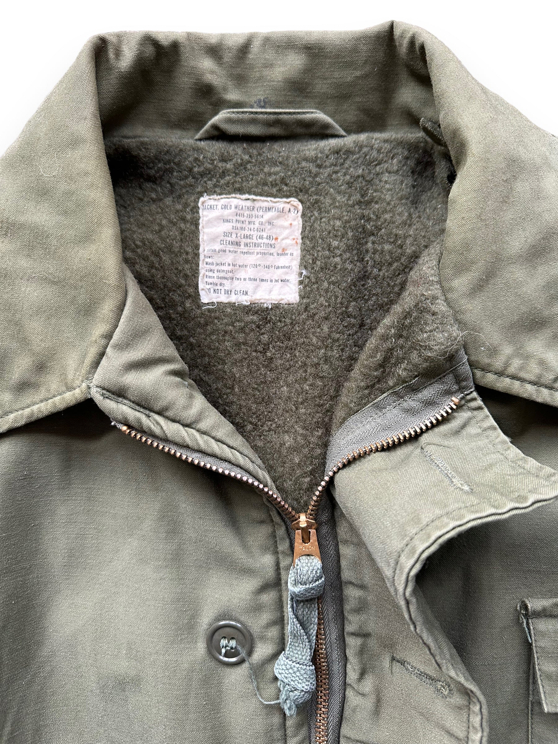 Tag View of Vintage Viet Nam Era Cold Weather A-2 Jacket SZ XL | Vintage Military Jackets Seattle | Barn Owl Vintage Clothing Seattle