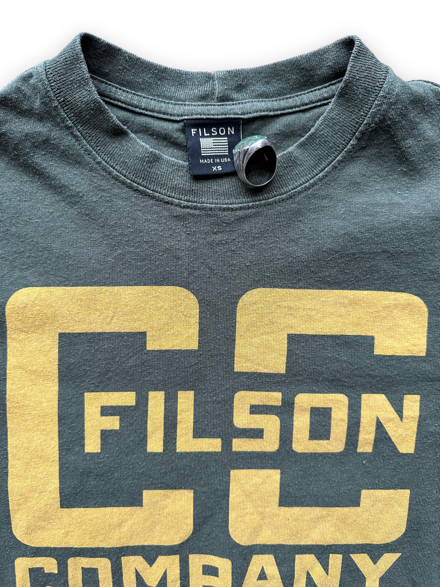 Tag View of Olive Green Filson Cotton Tee SZ XS | Barn Owl Vintage Goods | Filson Graphic Tees Seattle