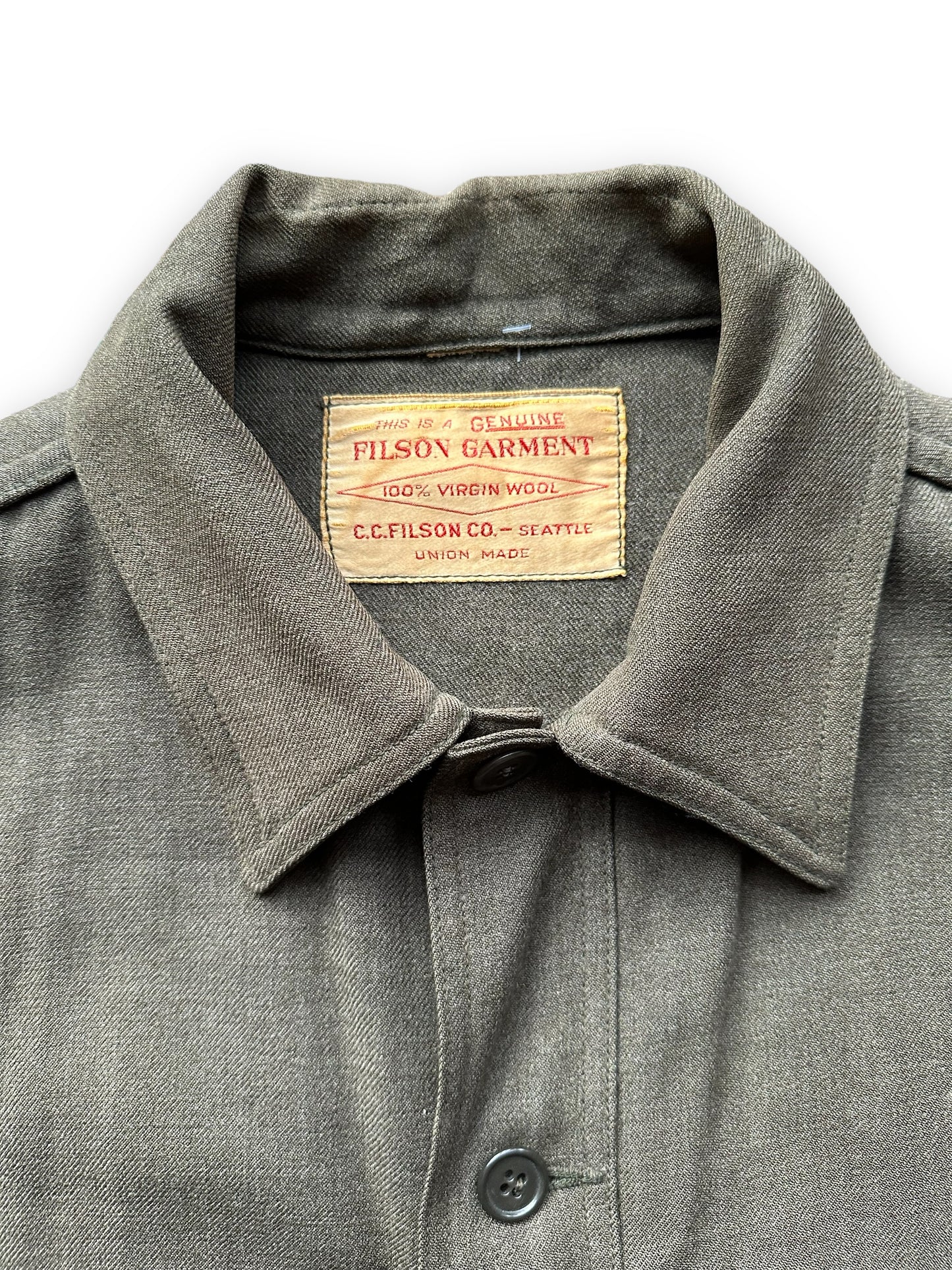 Tag View of Vintage Union Made Era 50s Filson Forestry Cloth Cruiser SZ 44 | Barn Owl Vintage Goods | Vintage Workwear Seattle
