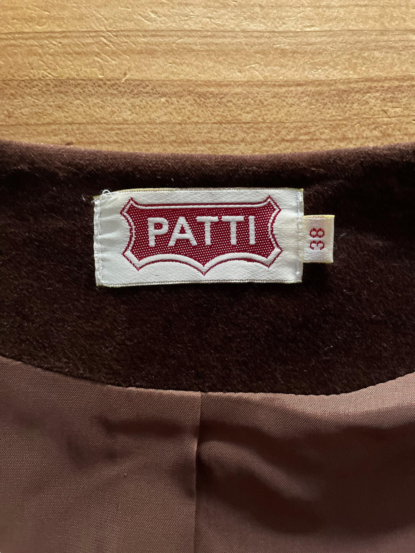Close up of label Vintage 1960s Brown Velvet Vest | Barn Owl Seattle | Vintage 1960s Velvet Vests
