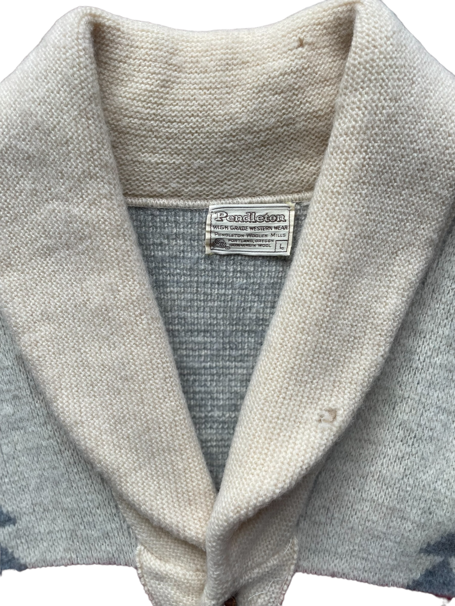 Vintage Pendleton Western Wear Cardigan Sweater | Barn Owl Vintage | Seattle Vintage Sweaters Close up of maker tag and shawl collar with holes and wear visible.