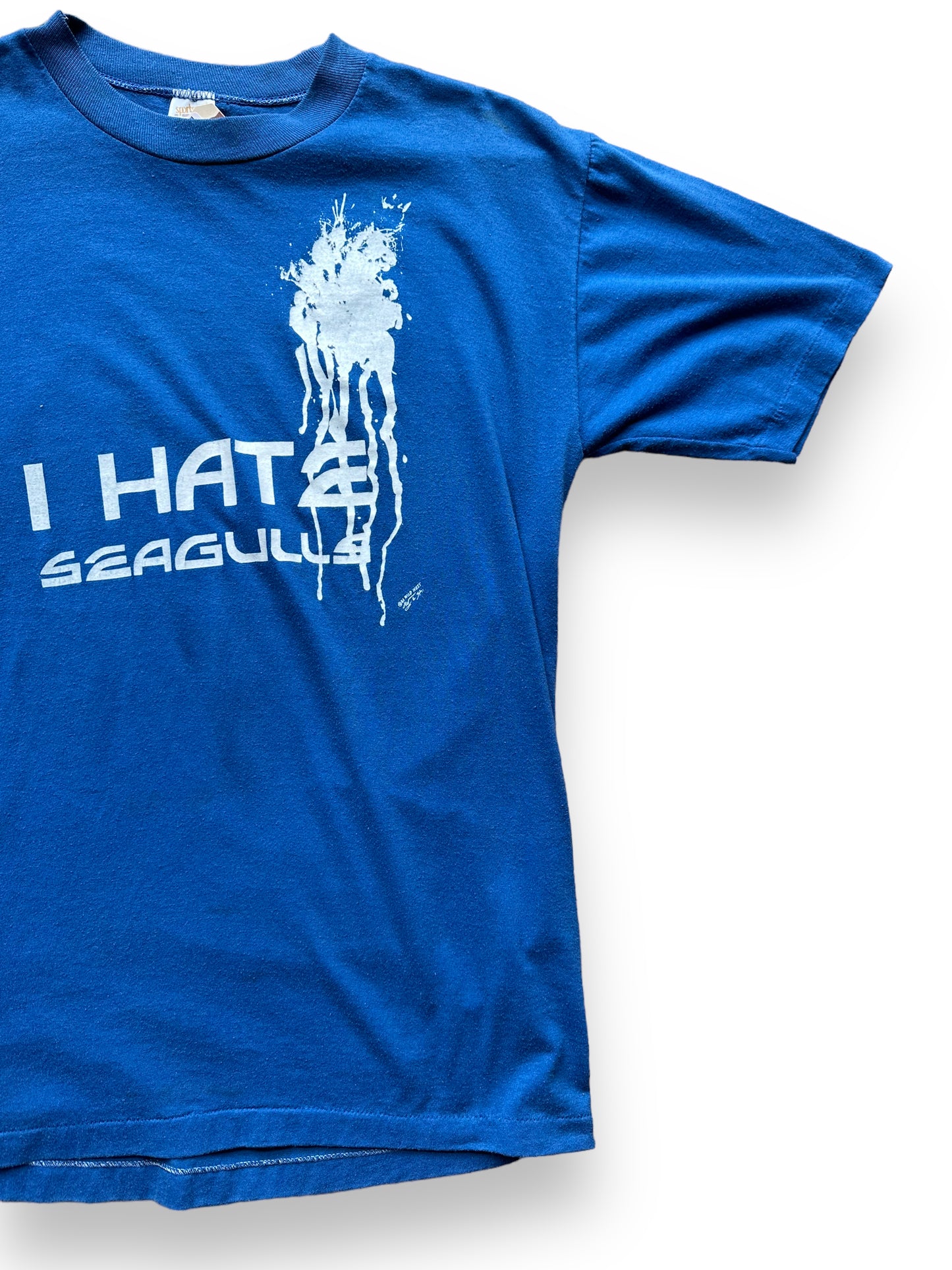 Front left shot of Vintage Blue I Hate Seagulls Tee SZ L | Vintage T-Shirts Seattle | Barn Owl Vintage Tees Seattle