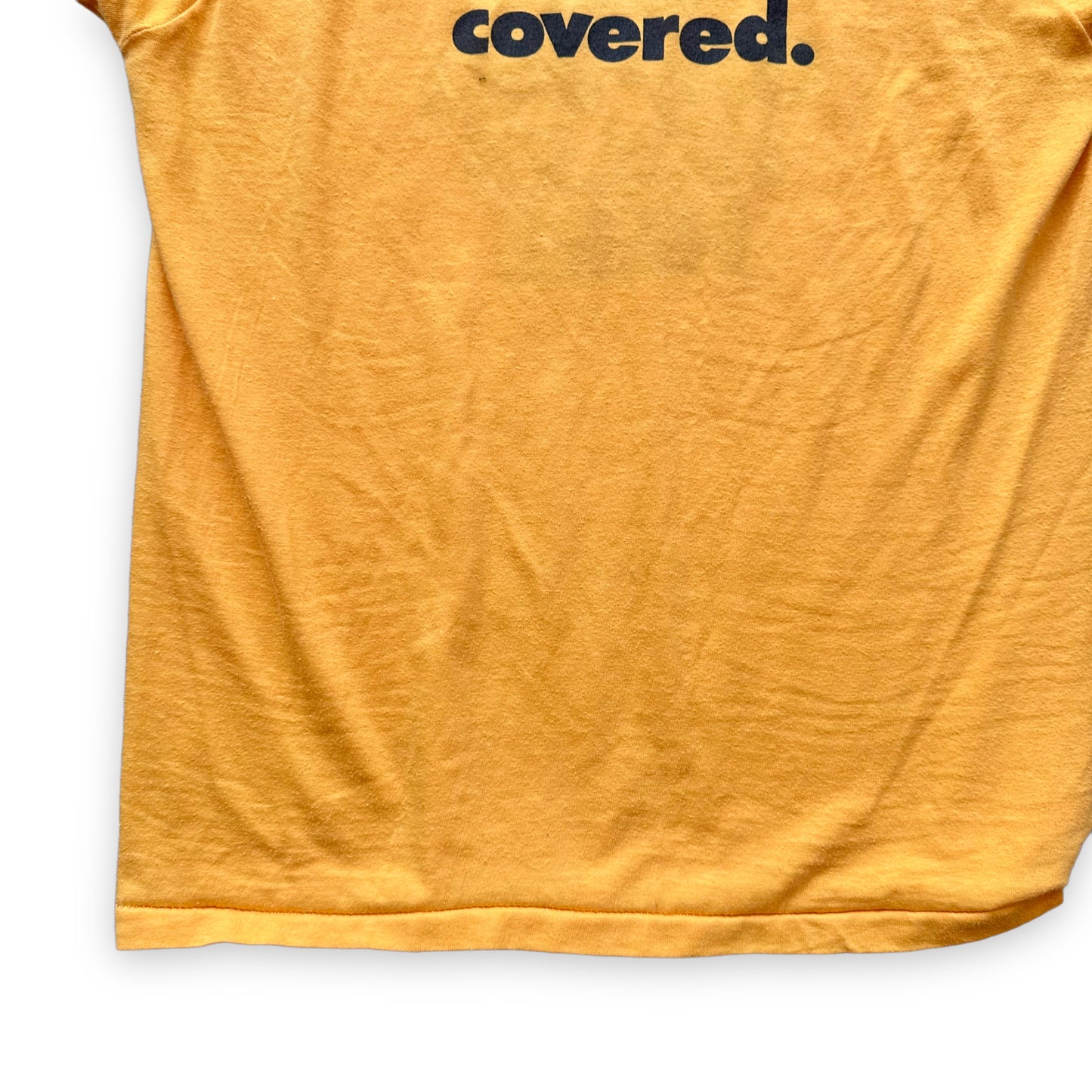 Lower Rear View of Vintage Activision No Gaping Holes Graphic Tee Template SZ S | Vintage Video Game Tee Seattle | Barn Owl Vintage