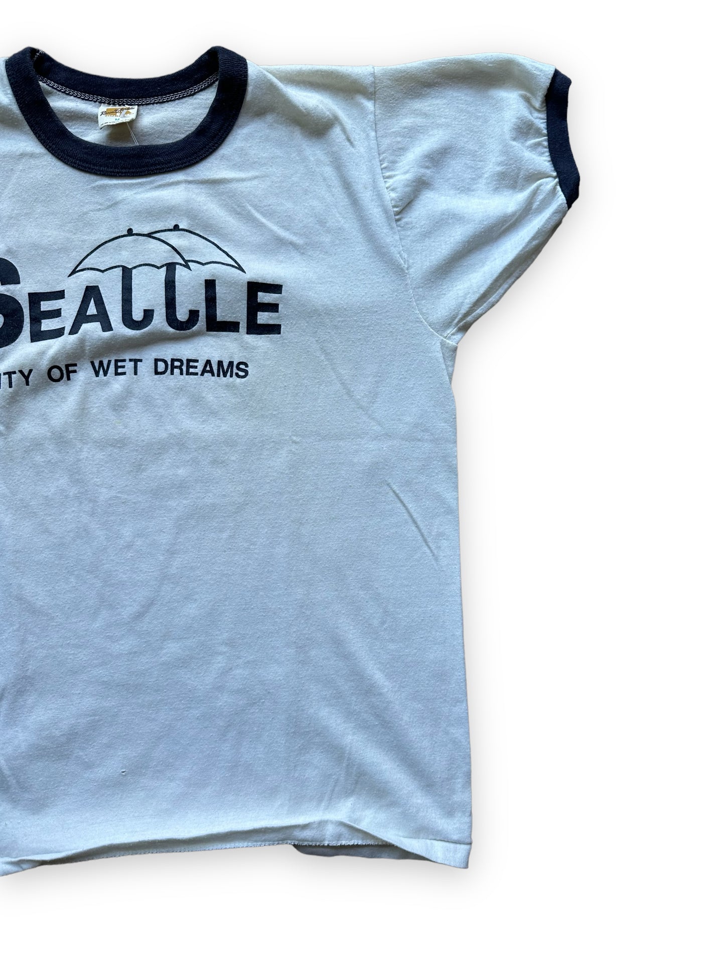 Left Front View of Vintage Seattle City of Wet Dreams Ringer Tee SZ M | Vintage Russell Athletic T Shirt | Barn Owl Vintage Seattle