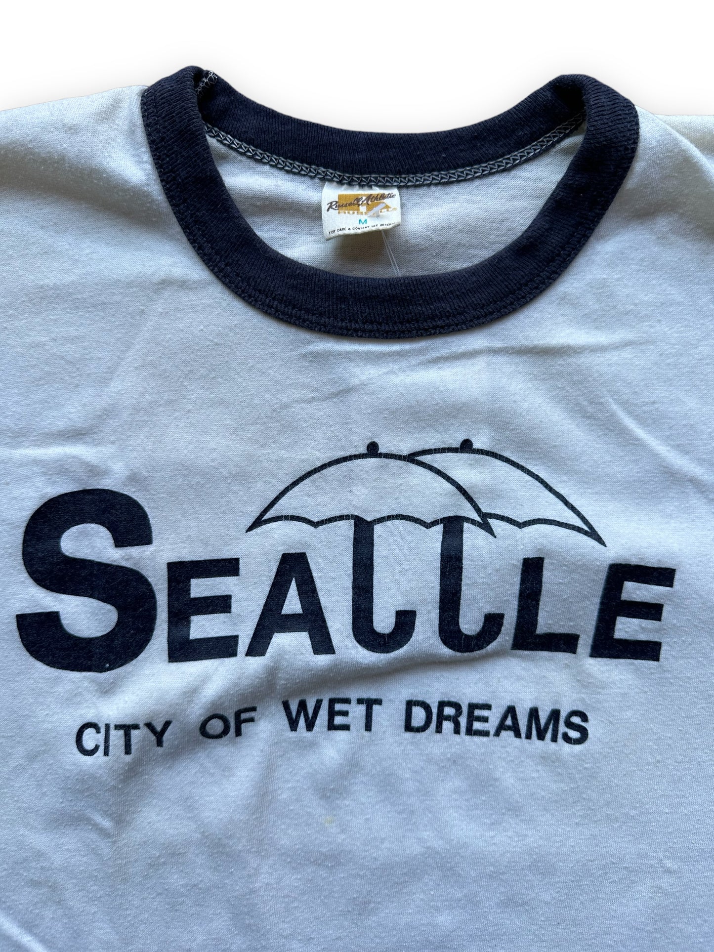 Tag View on Vintage Seattle City of Wet Dreams Ringer Tee SZ M | Vintage Russell Athletic T Shirt | Barn Owl Vintage Seattle